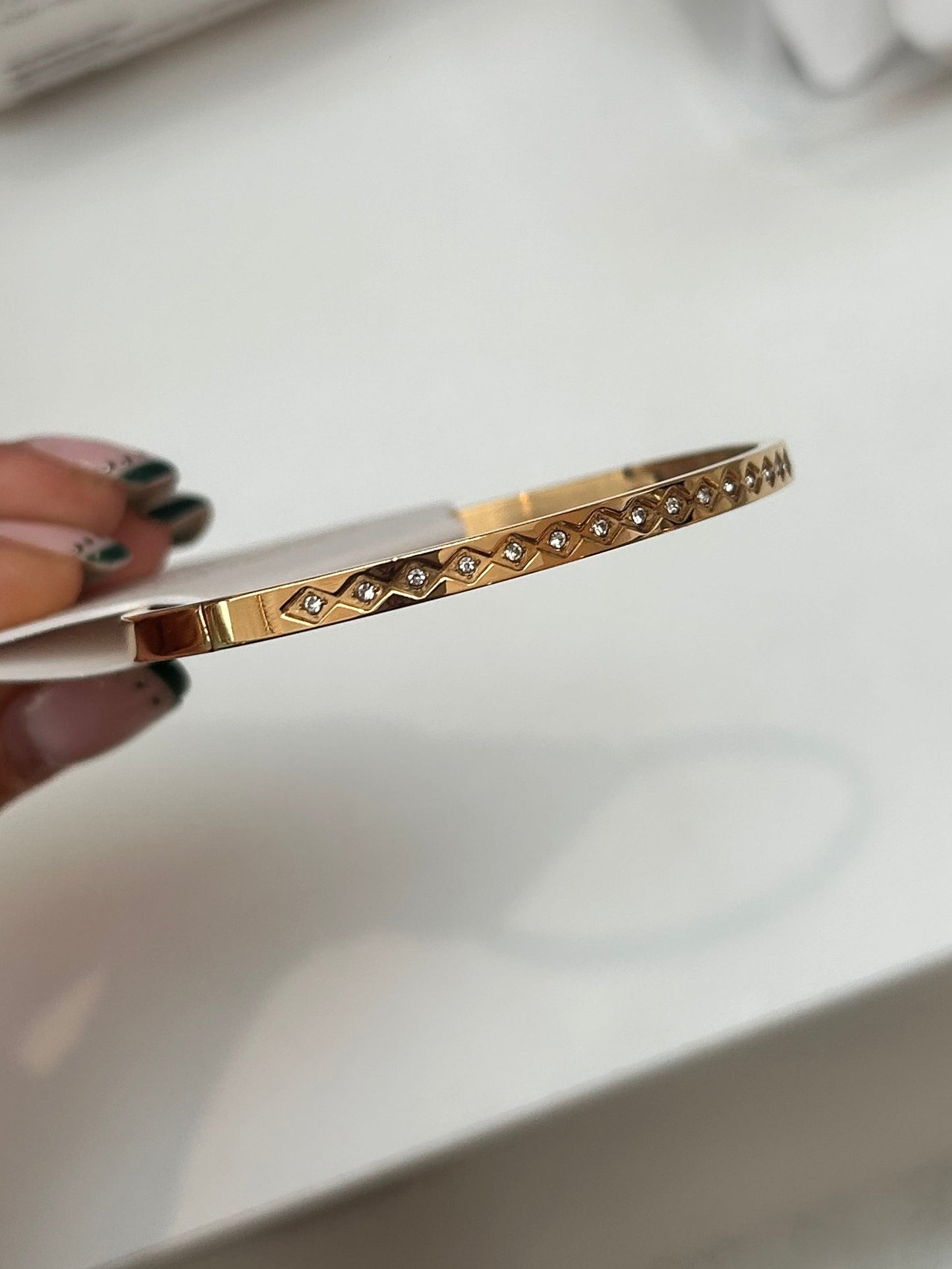 
                  
                    Aster Gold Diamond Motif Bangle — original display photo
                  
                