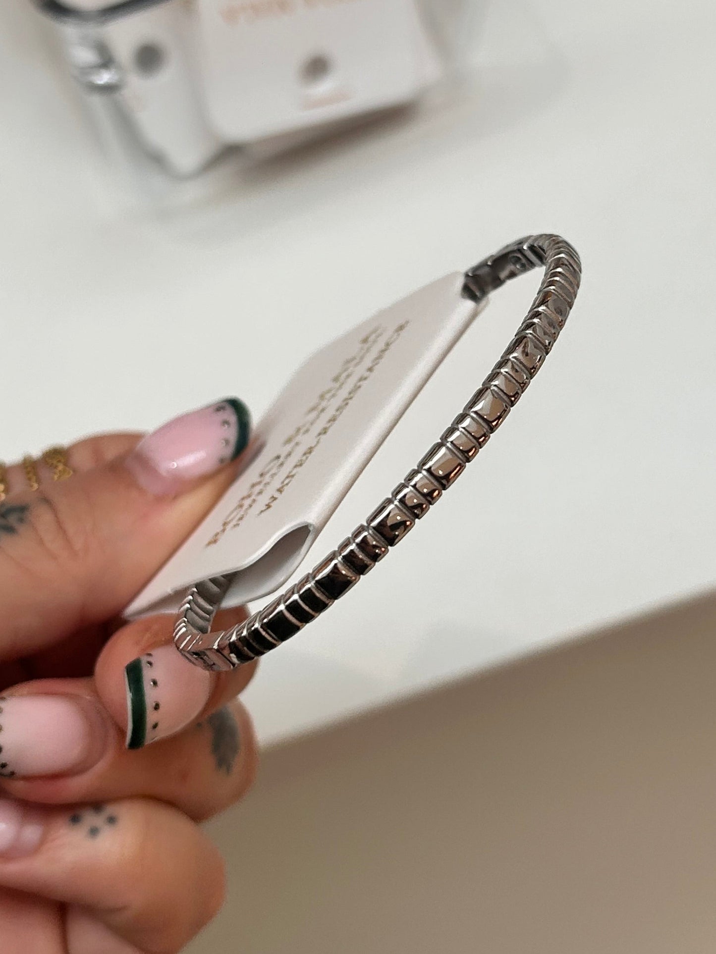 
                  
                    Talia Silver Textured Bangle — original display photo
                  
                