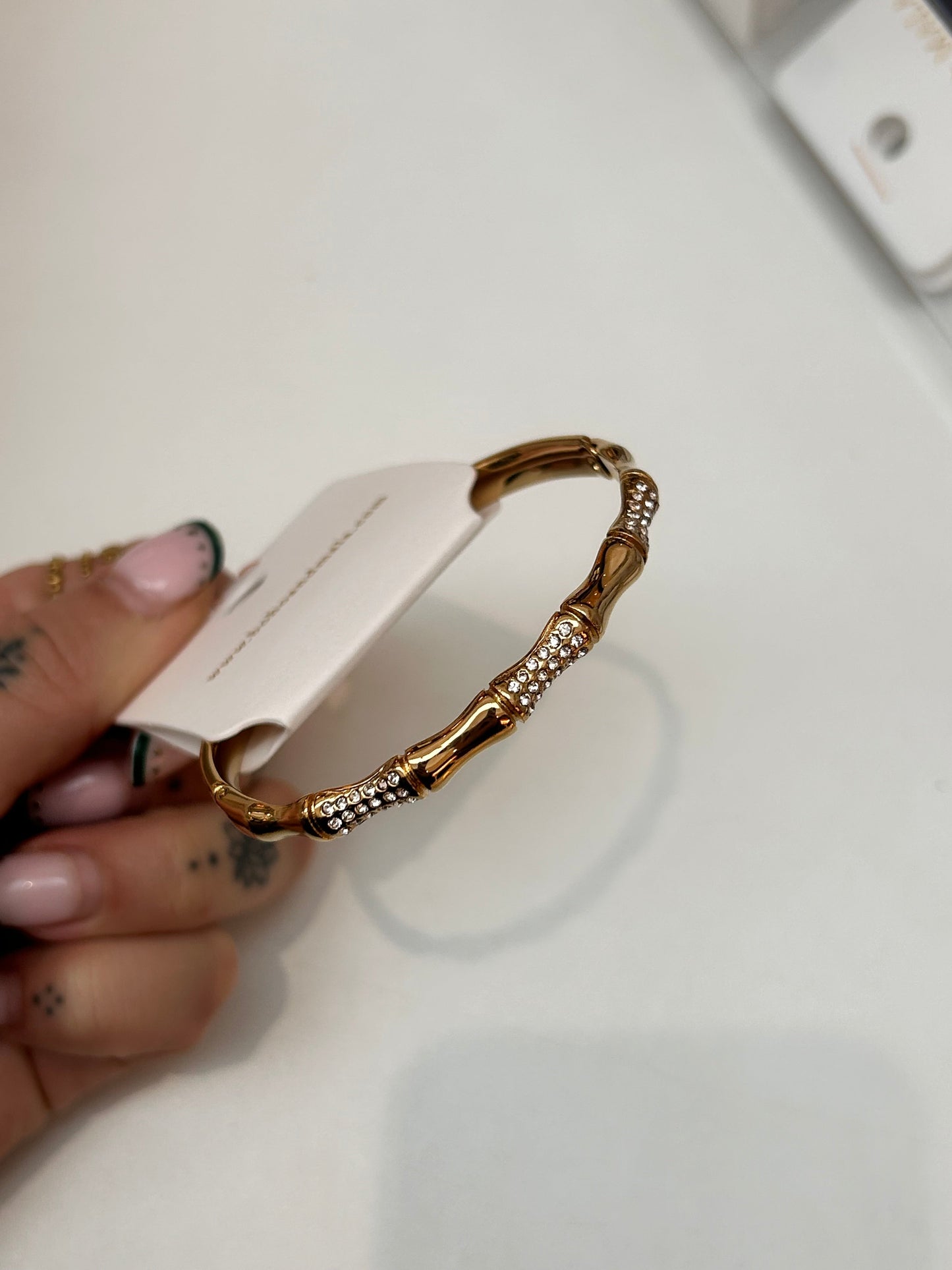 
                  
                    Serina Gold Ornate Crystal Bangle — original display photo
                  
                