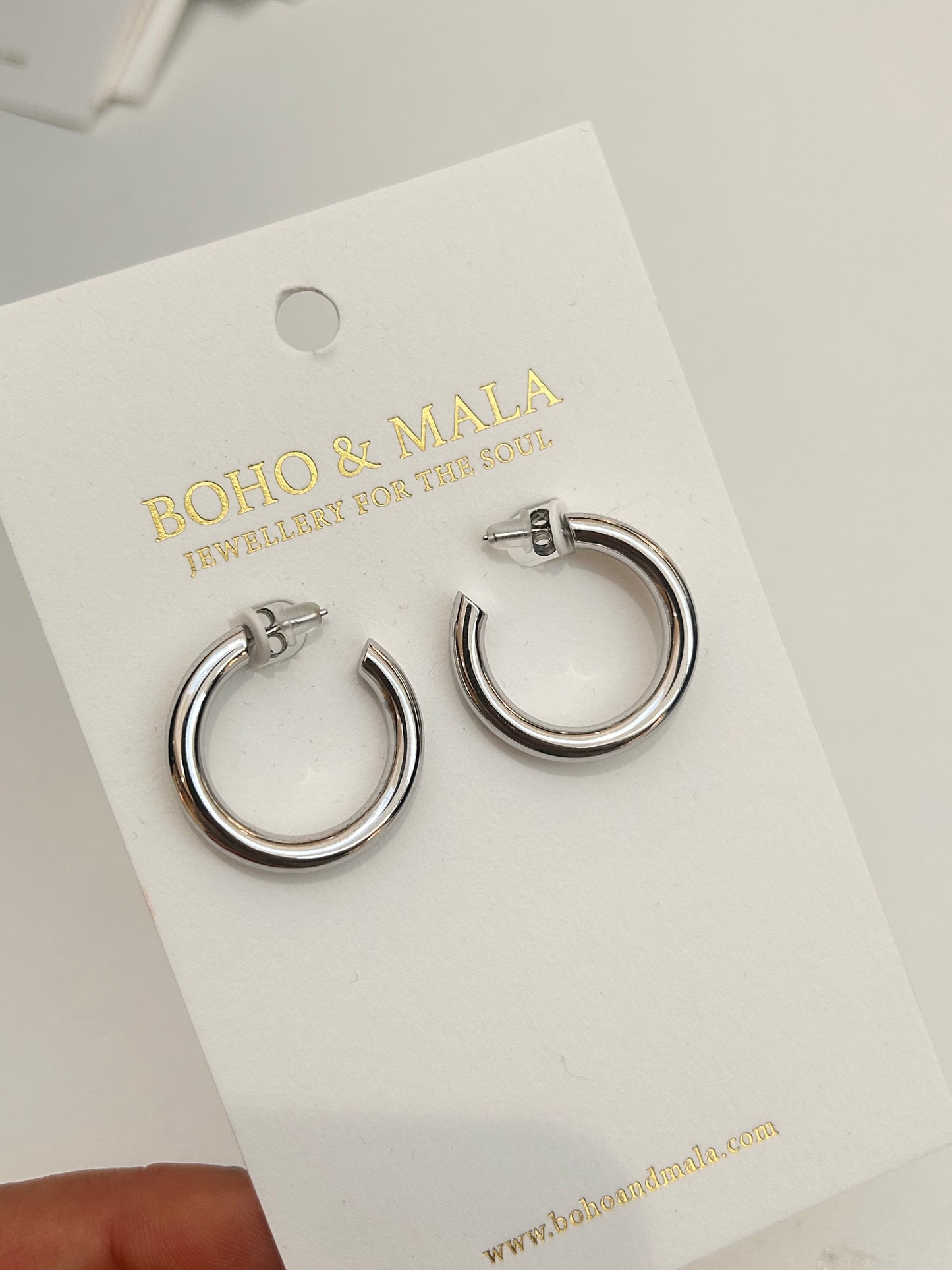 
                  
                    Orlina Silver Classic Hoop Earrings
                  
                