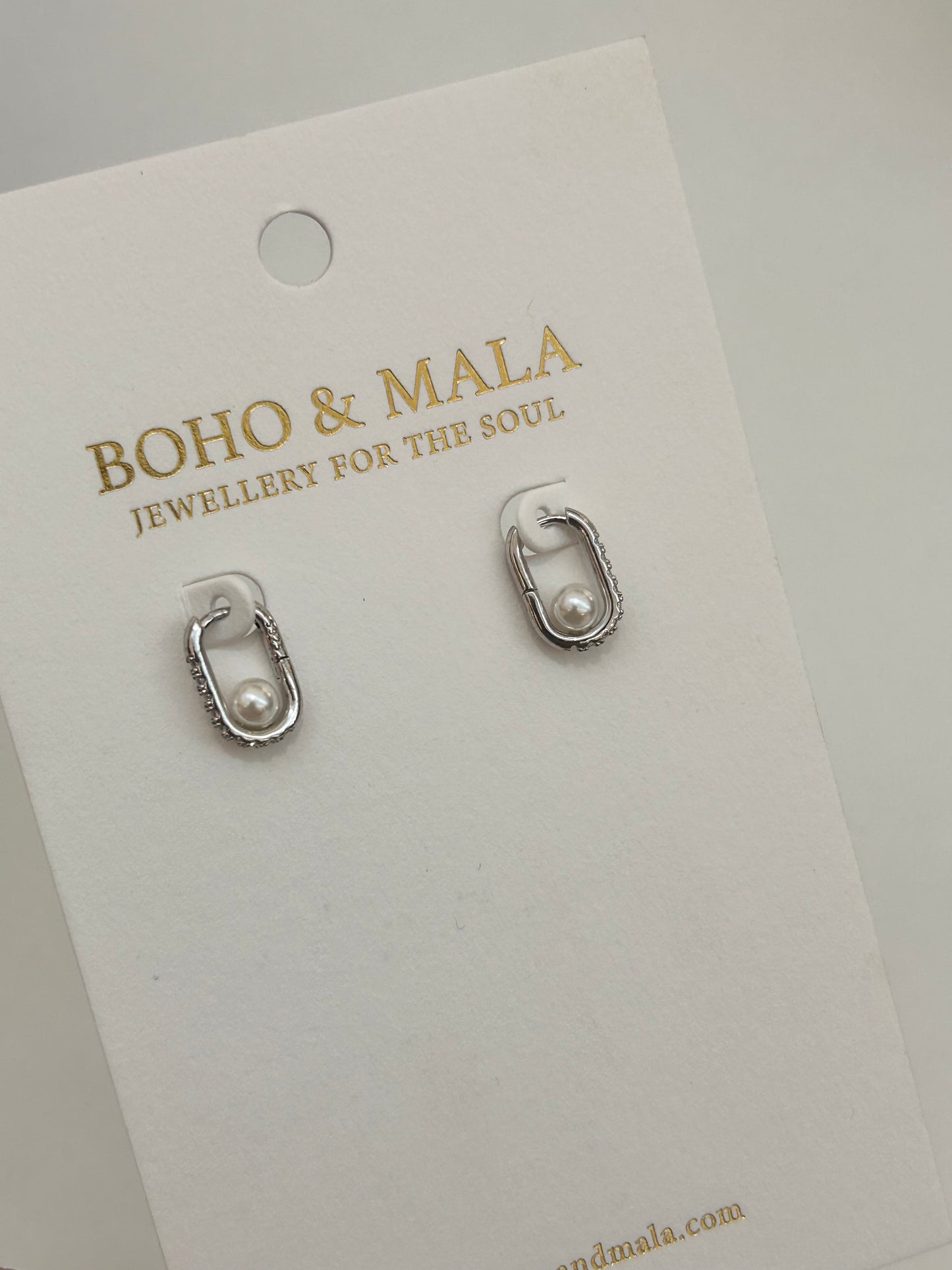 
                  
                    Odette Silver Pearl Oval Hoop Earrings
                  
                