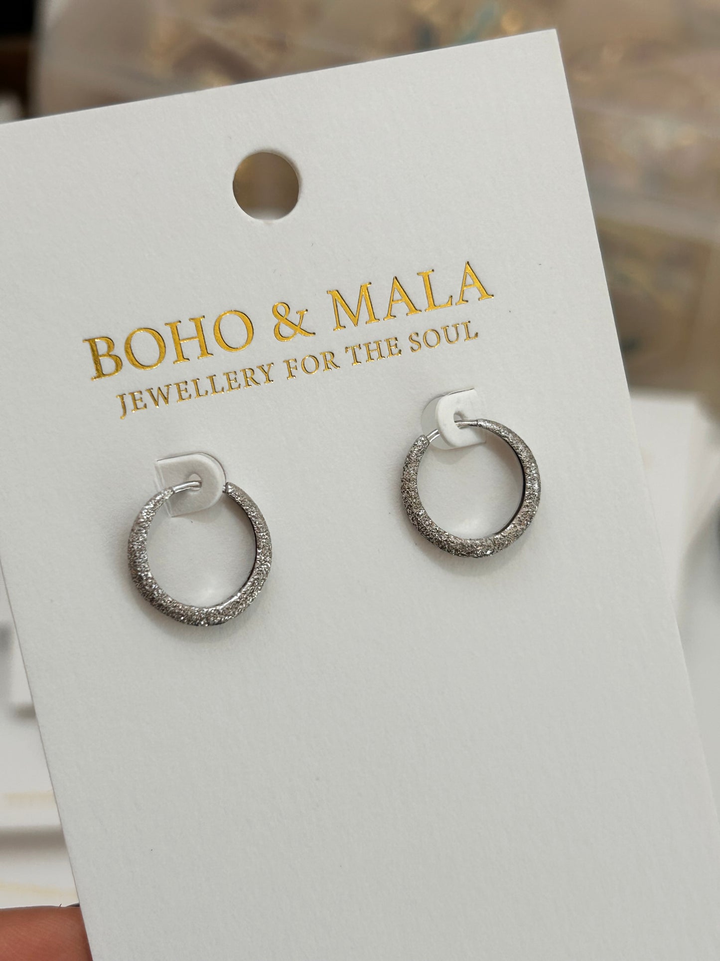 
                  
                    Cielle Silver Shimmer Hoop Earrings
                  
                