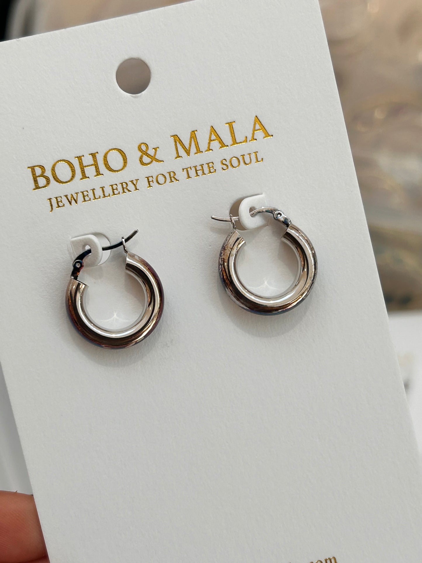 
                  
                    Leonora Silver Rounded Hoop Earrings
                  
                