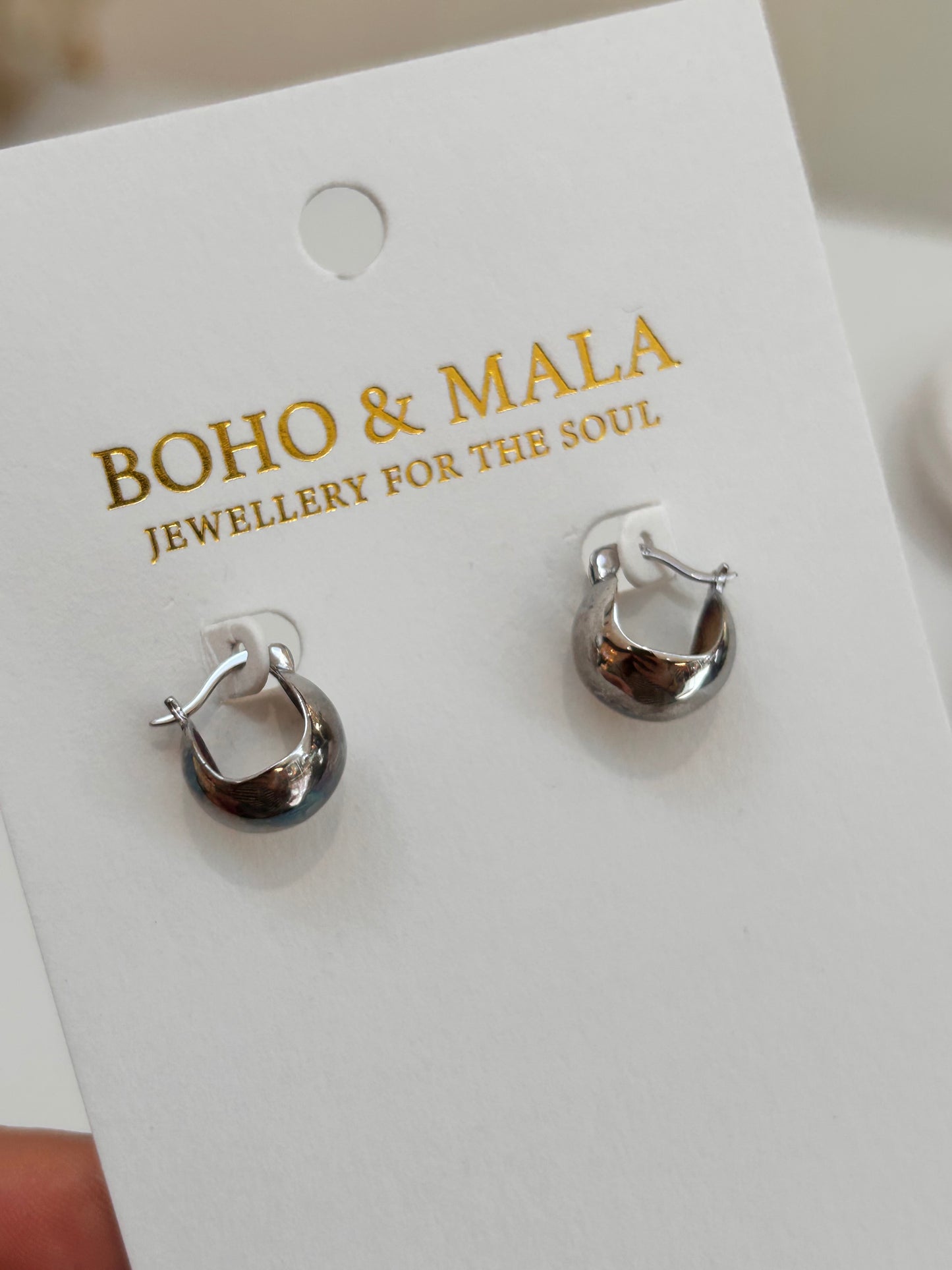 
                  
                    Aviana Silver Crescent Hoop Earrings
                  
                