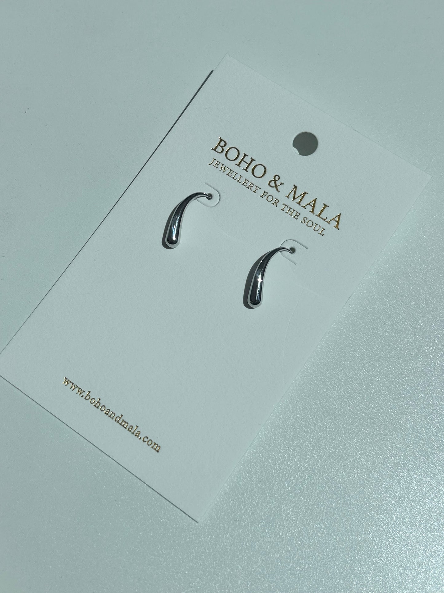 
                  
                    Viera Silver Sweeping Drop Earrings
                  
                