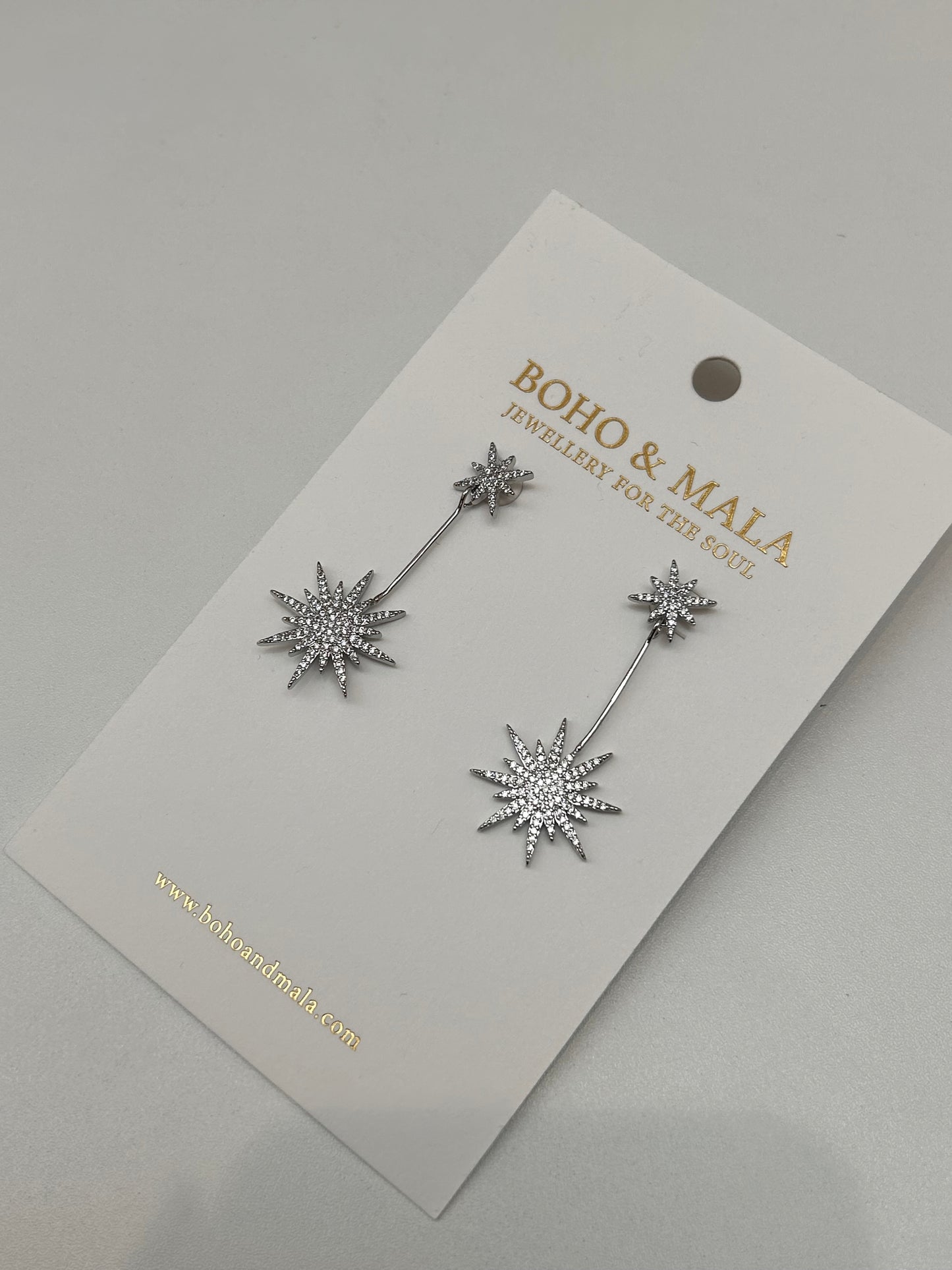
                  
                    Asteria Silver Starburst Drop Earrings
                  
                