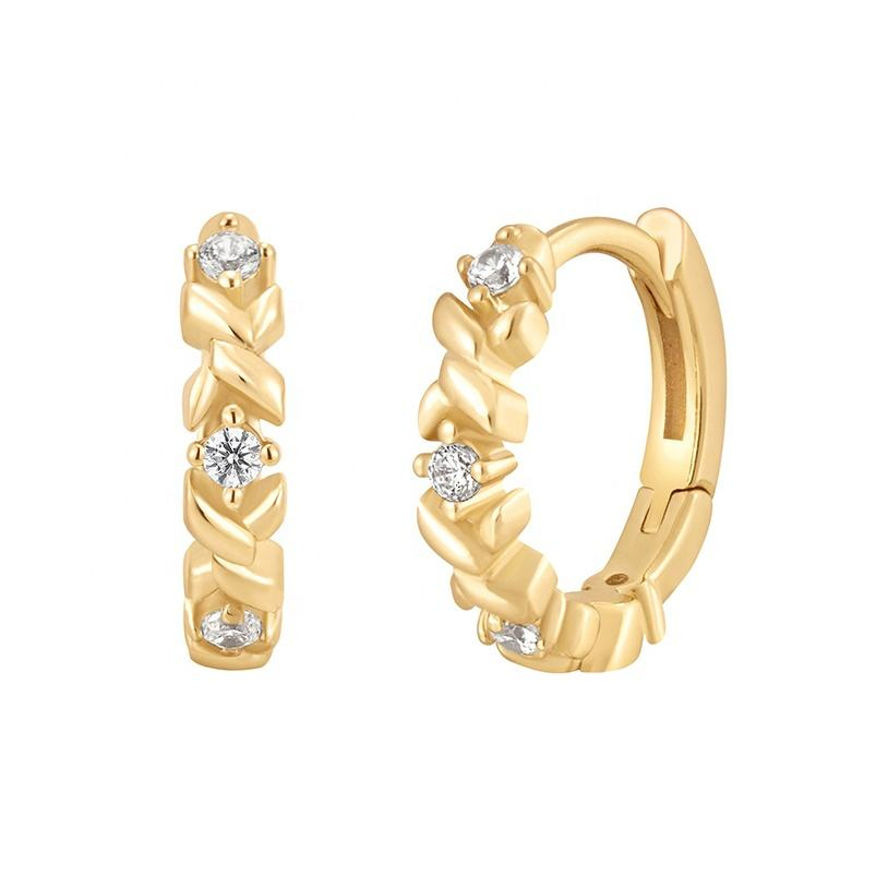 
                  
                    Aurelia Crystal Twist Huggie Earrings original image
                  
                