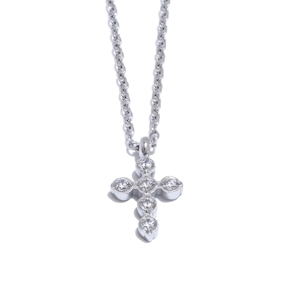 
                  
                    Silver zircon cross necklace original detail photograph
                  
                