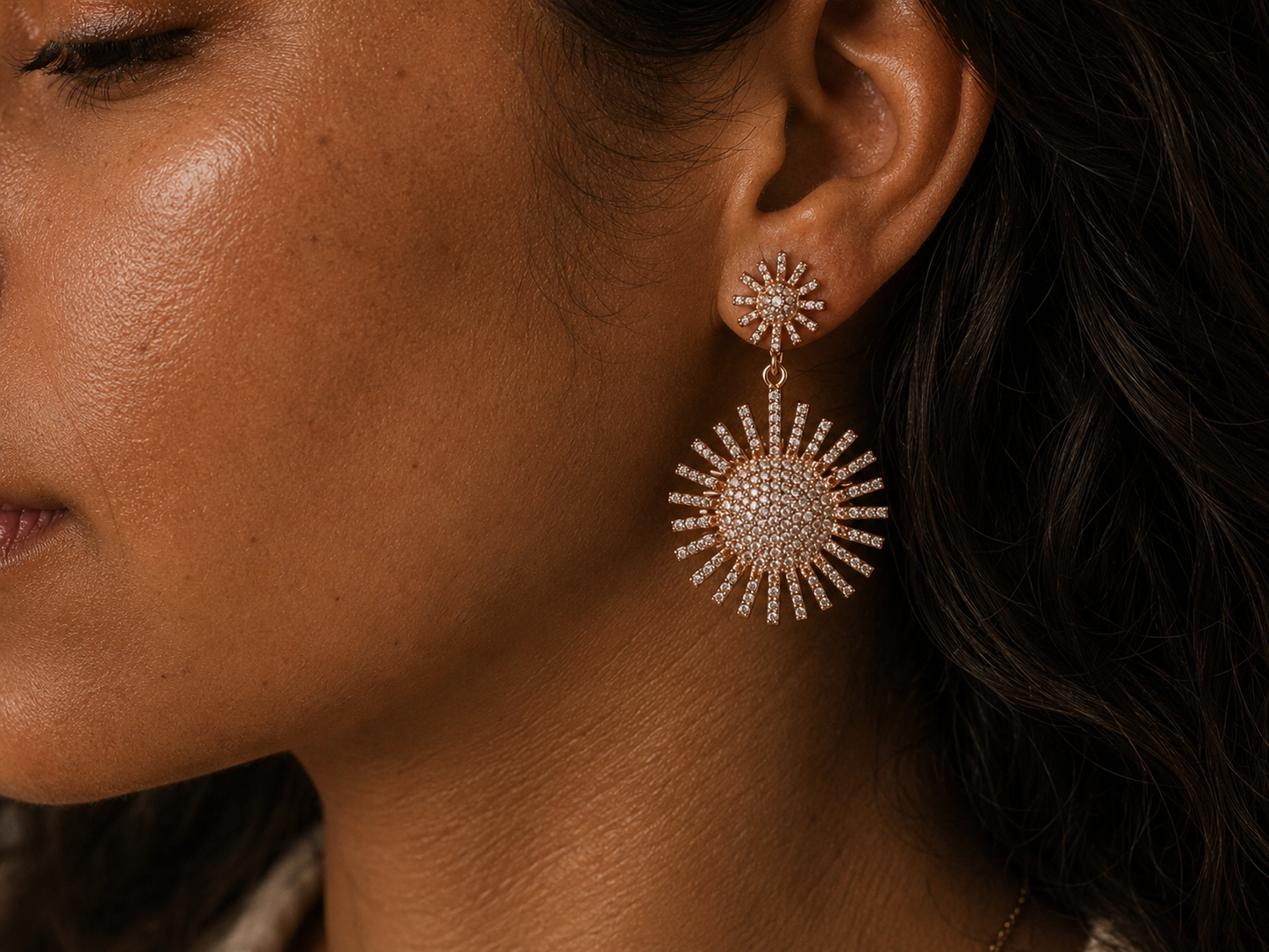 
                  
                    model wearing big statement sparkle sun like earrings 
                  
                