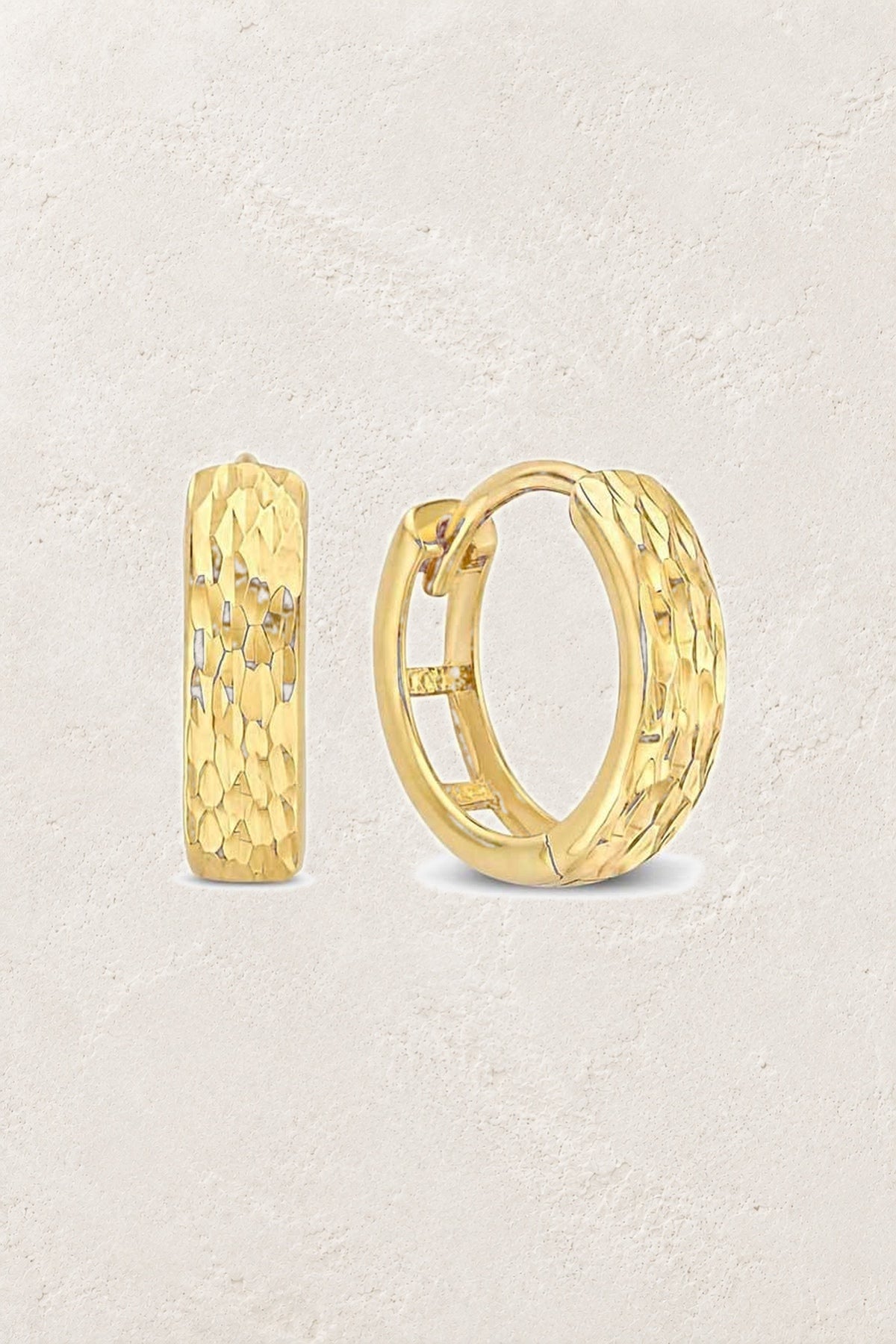 
                  
                    Amara Textured Gold Huggie Earrings
                  
                