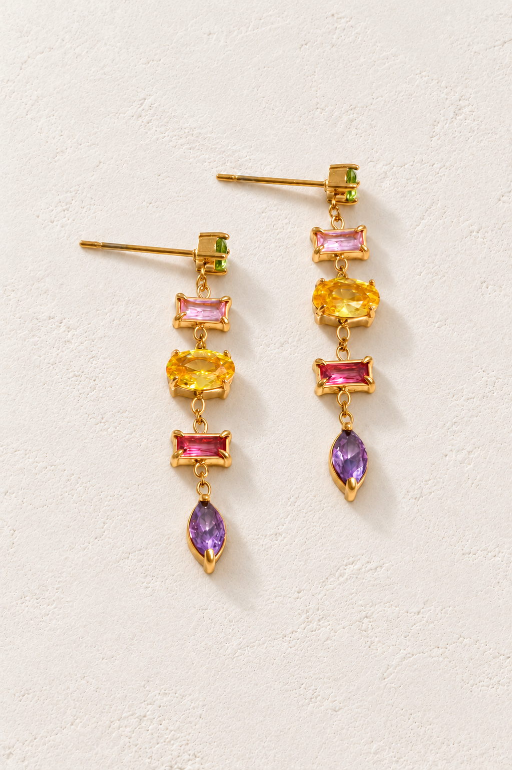 
                  
                    Crystal Cascade Drop Earrings – Gold & Multicolour on approved cream hero background
                  
                