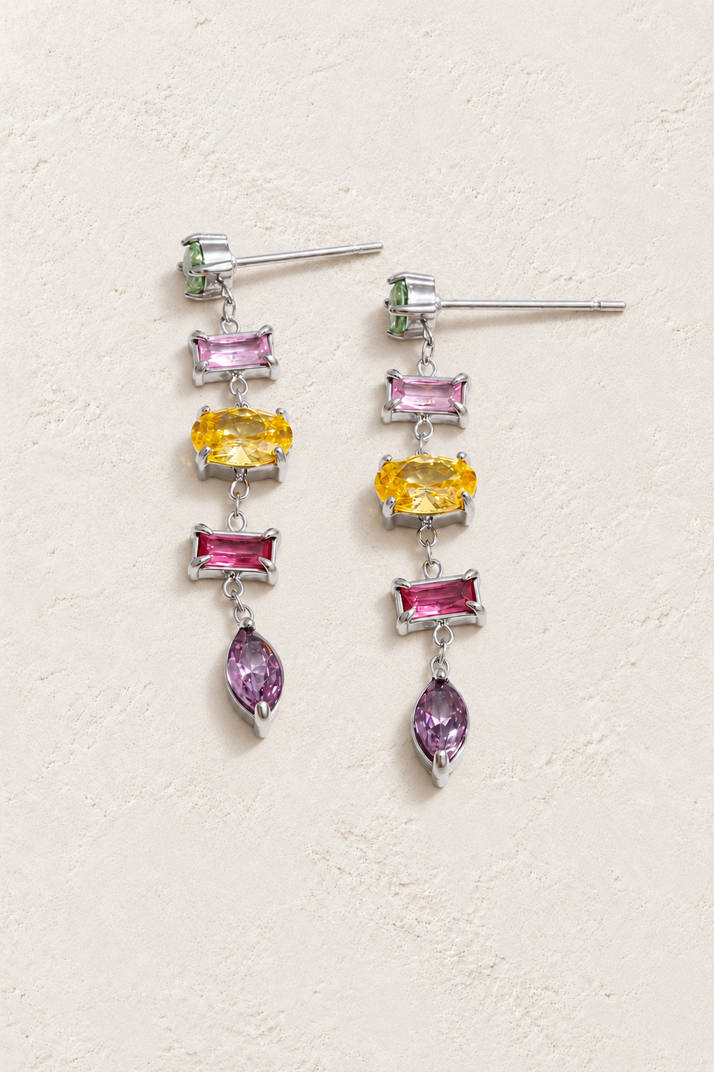 
                  
                    Silver & Multicolour crystal cascade earrings on approved cream hero background
                  
                