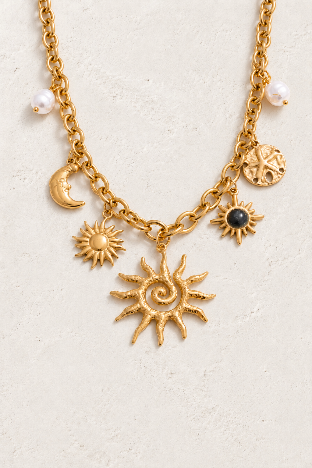 
                  
                    Sun & Moon Celestial Charm Necklace on approved cream hero background
                  
                