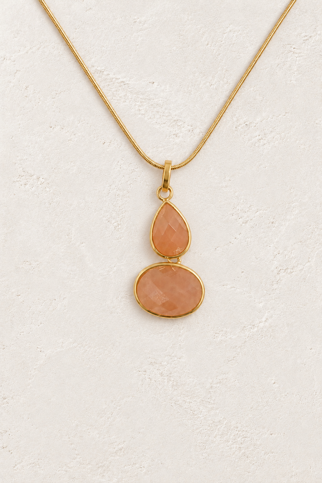 
                  
                    Sunstone double stone necklace on approved cream hero background
                  
                