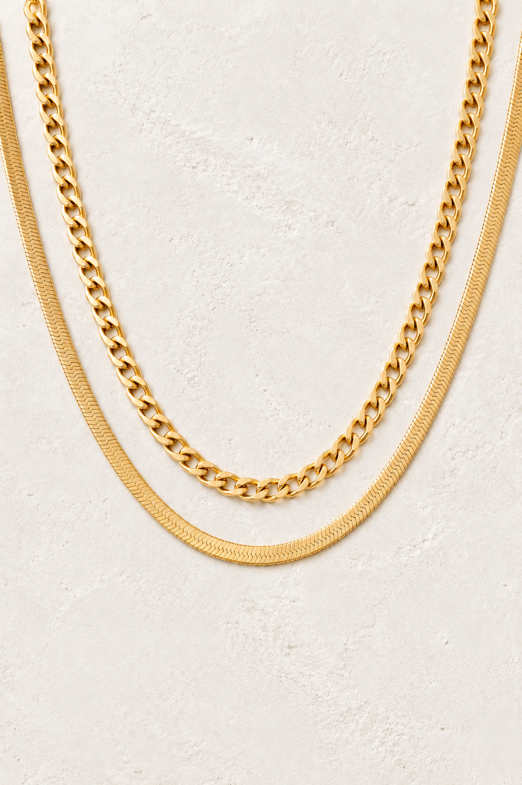 
                  
                    Aurelia Double Layer Chain Necklace on the Boho & Mala cream stone hero background
                  
                