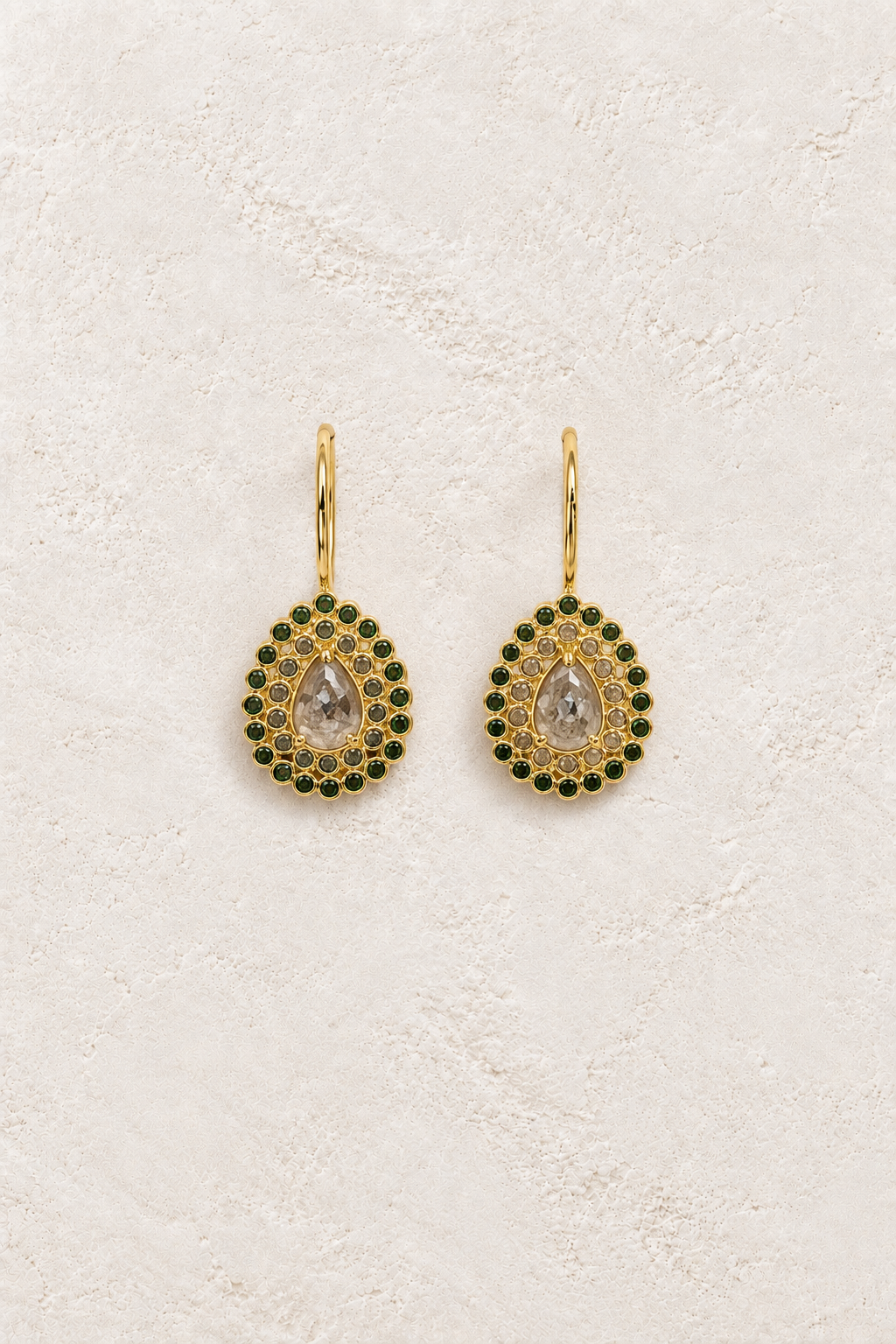 Aveline Earrings on warm ivory textured background