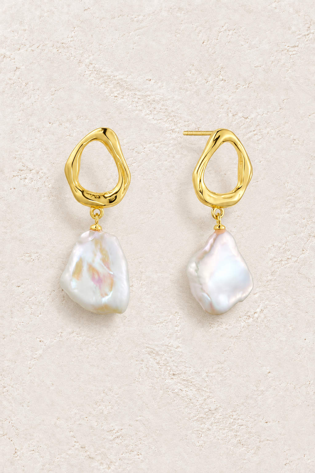 Baroque Pearl Organic Studs on warm ivory plaster