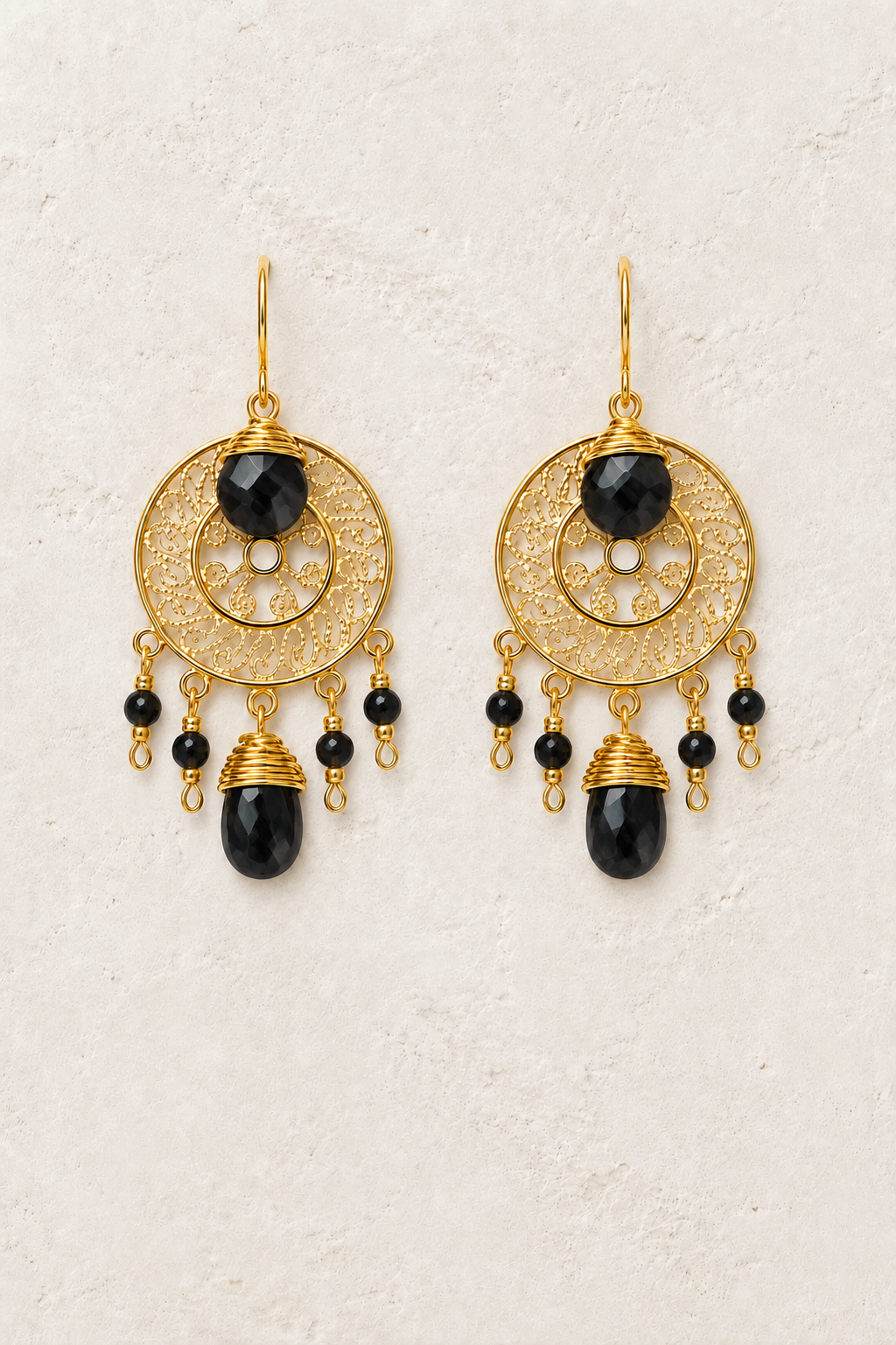 Black Obsidian Soleil genuine gemstone statement earrings on cream textured background