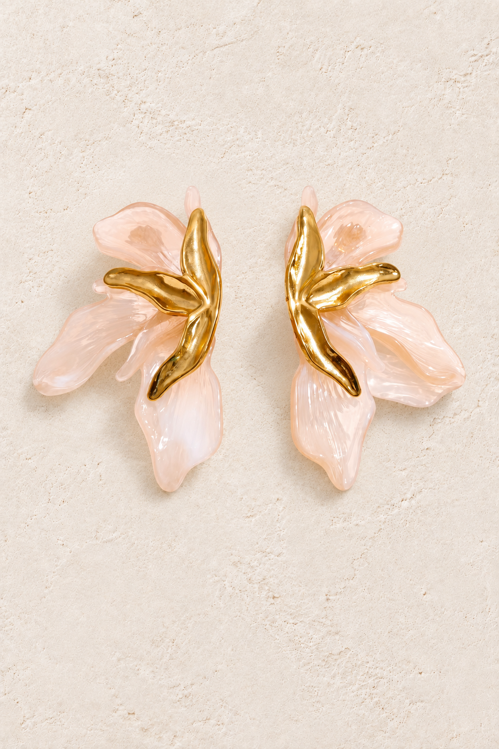 Blush Blossom Statement Earrings on warm ivory plaster