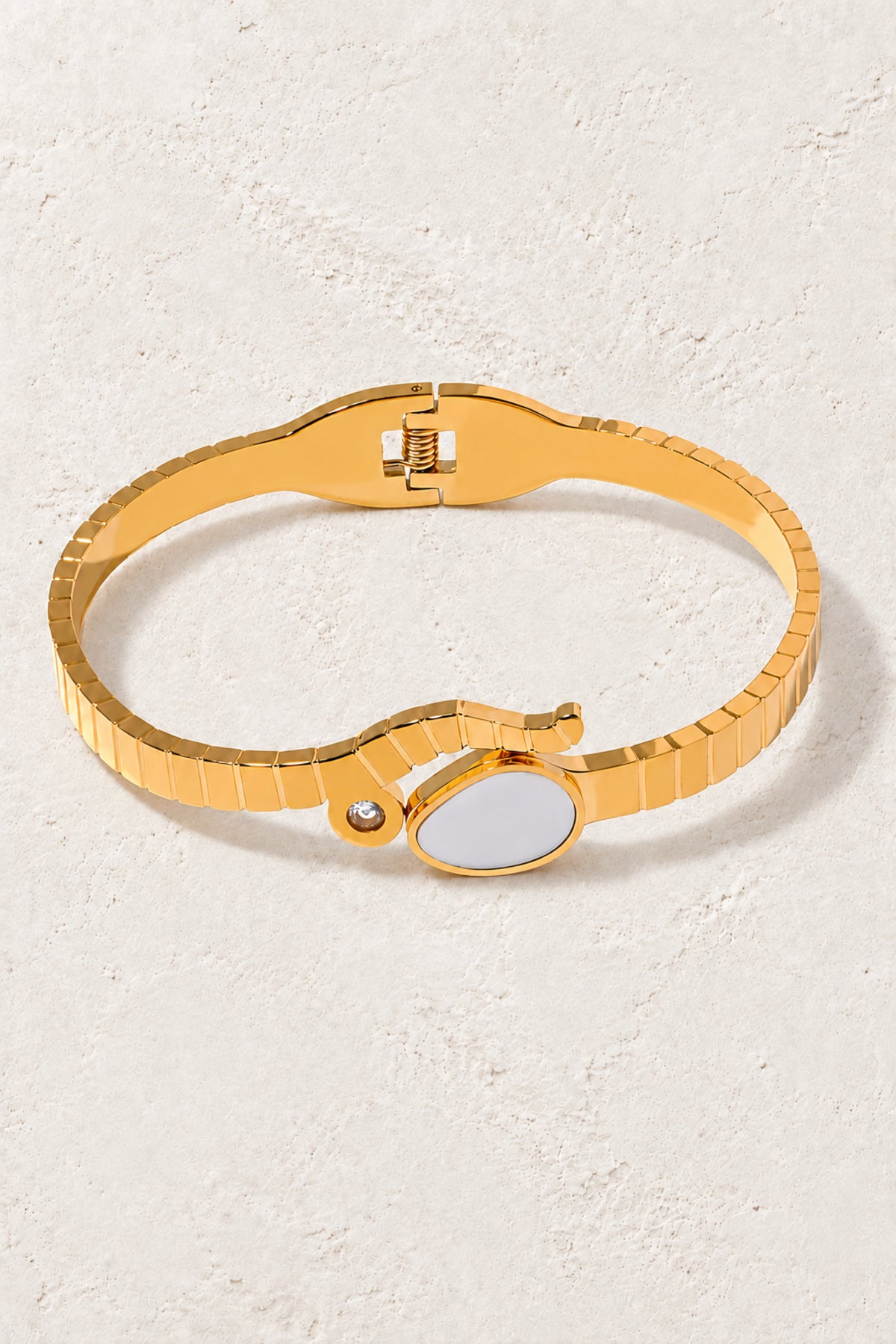 
                  
                    Boho & Mala Gold Cuff Bracelet on the approved Boho & Mala ivory plaster background
                  
                