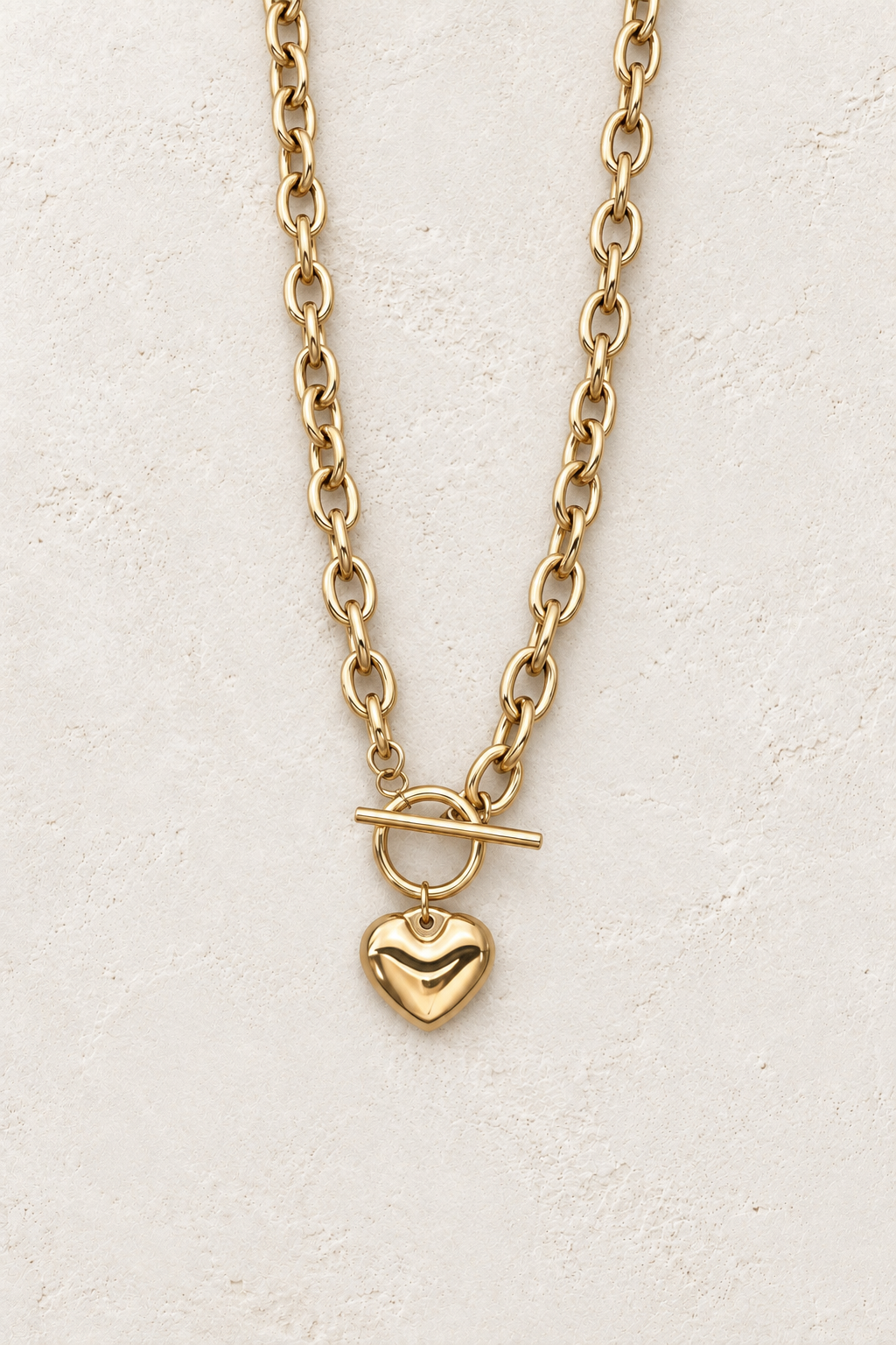 
                  
                    Amora Gold Heart Toggle Necklace on Francesca's approved original hero background
                  
                