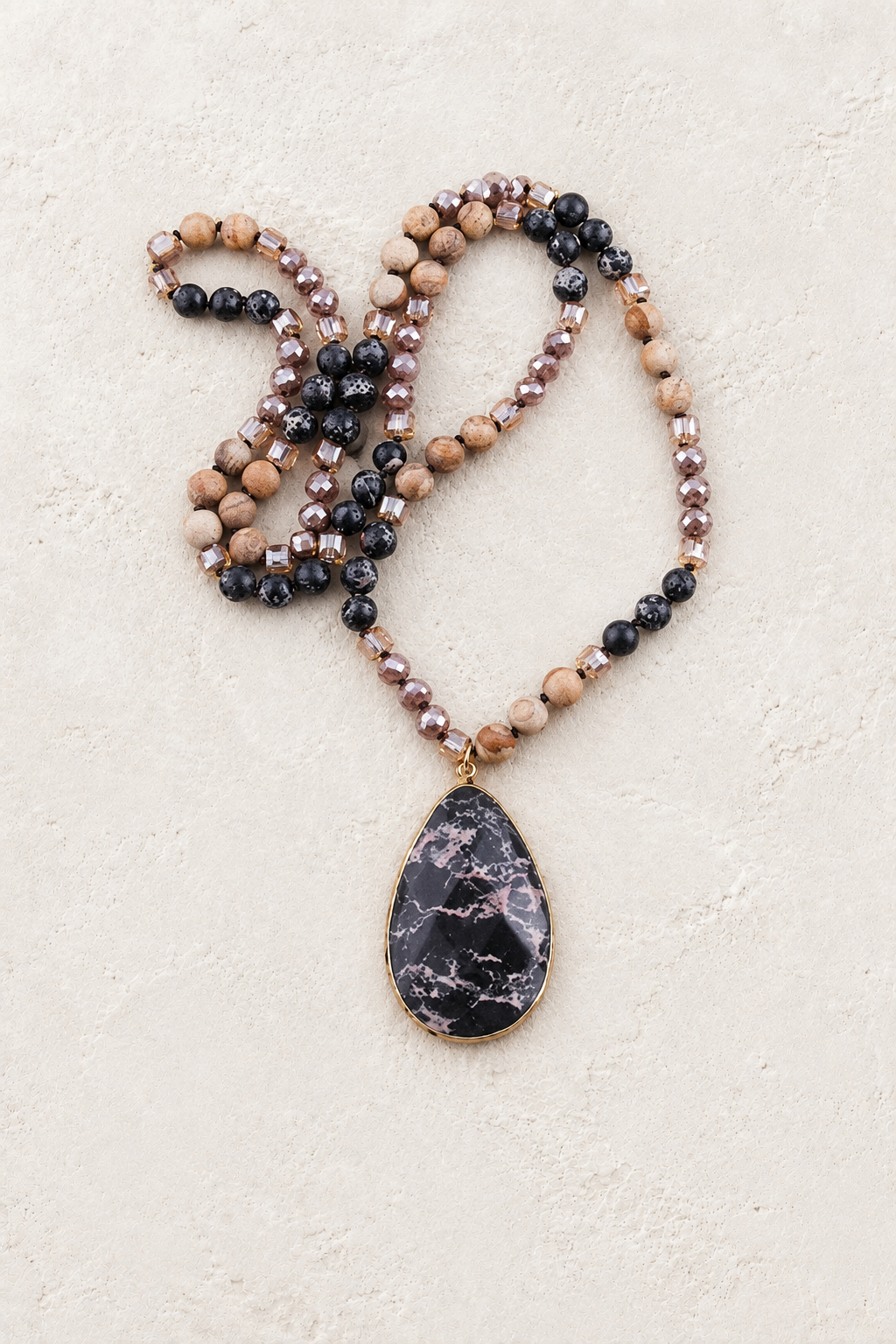 Dusk Tribal Stone Necklace on Francesca's approved original hero background