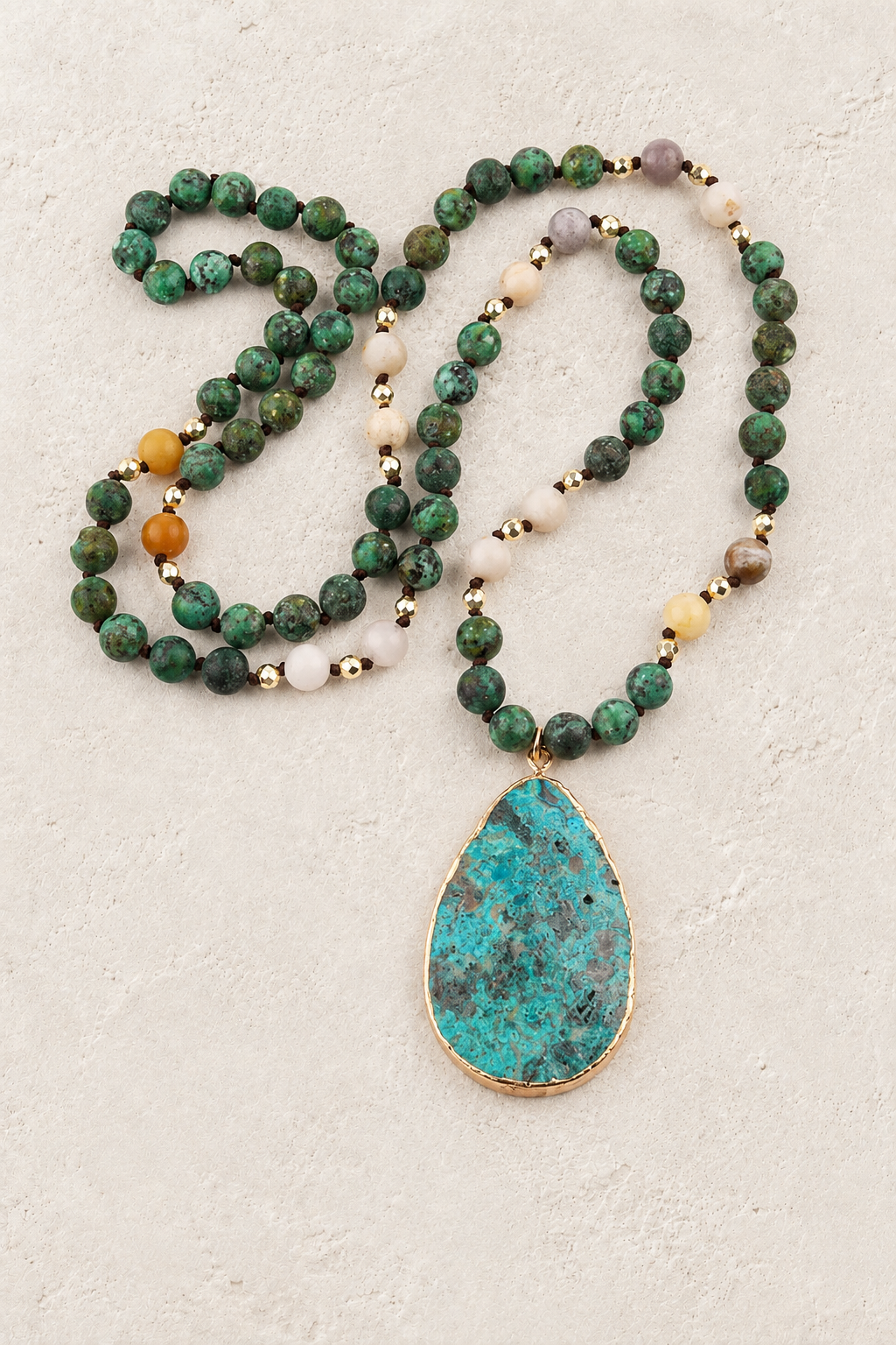 Verde Tribal Teardrop Necklace on Francesca's approved original hero background