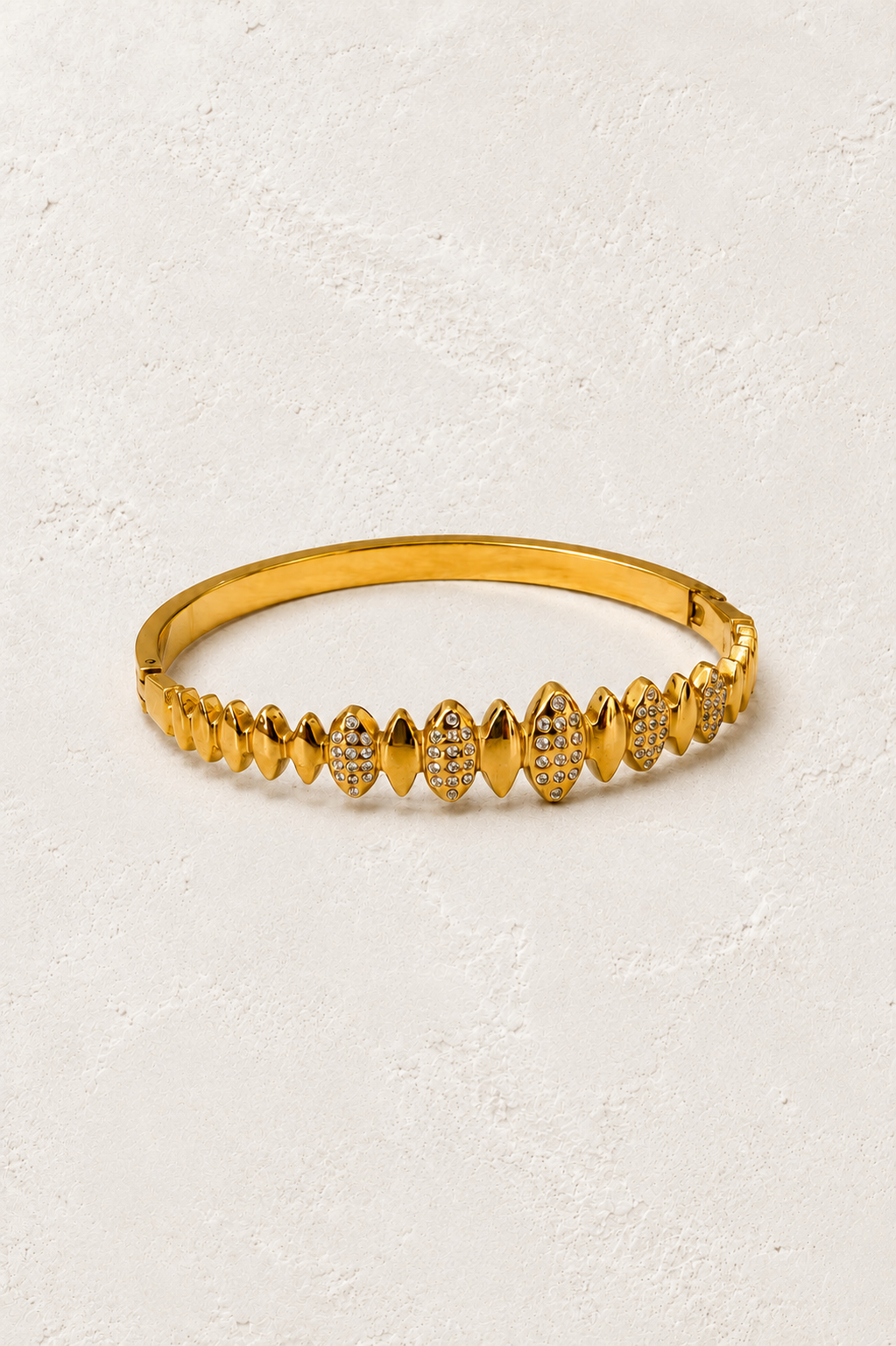 Solvaya Sculpted Gold Crystal Bangle on Francesca's supplied original hero background