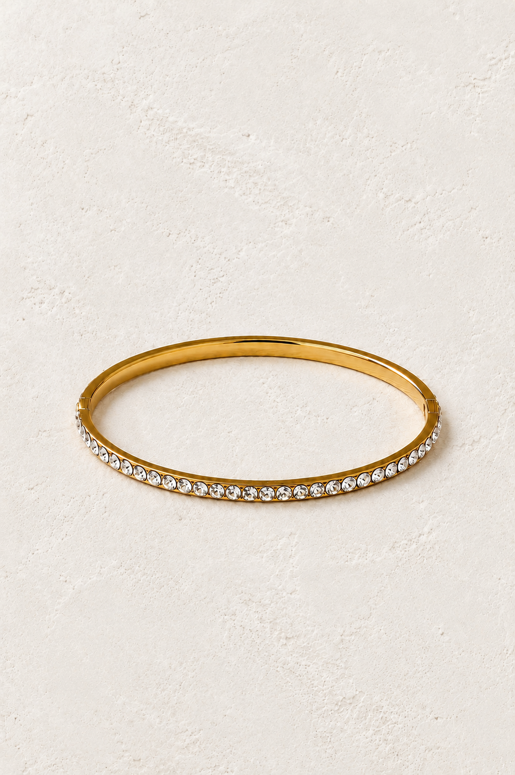 Elara Gold Tennis Bangle on Francesca's supplied original hero background