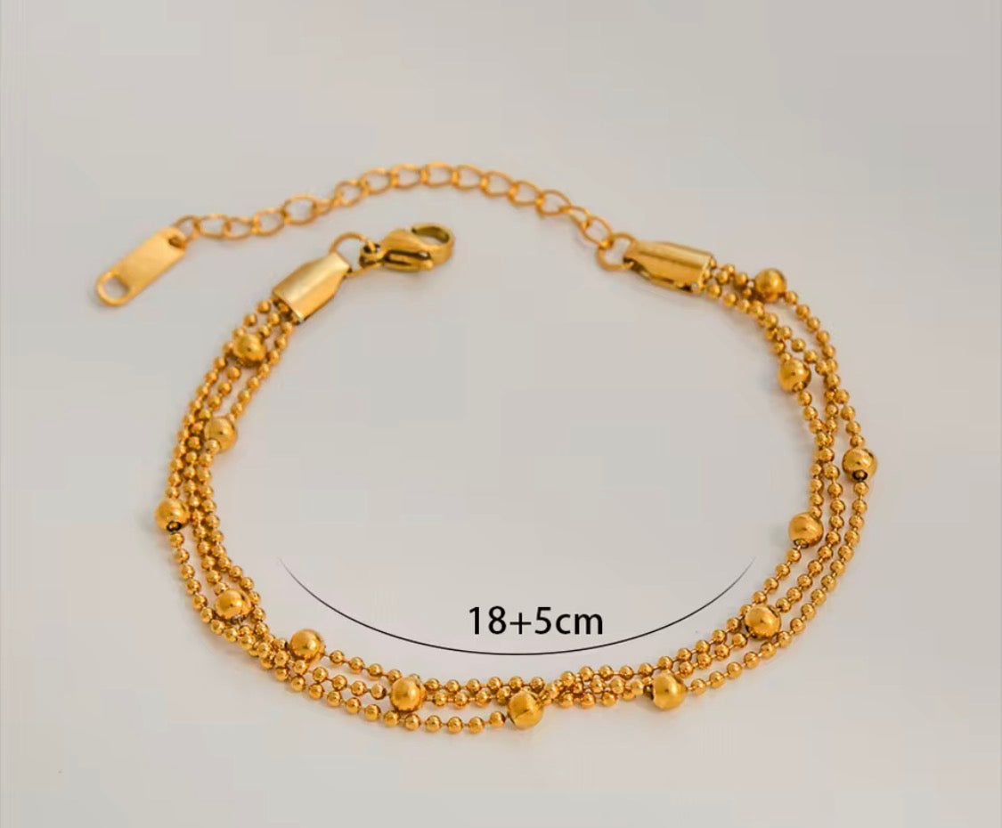 
                  
                    Gold Beaded Layered Bracelet with measurements
                  
                