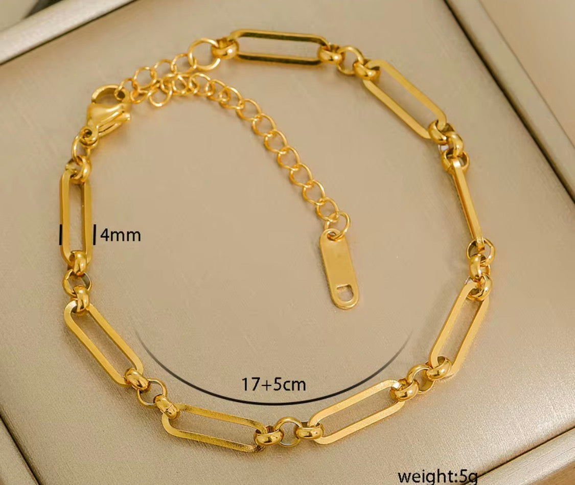 
                  
                    Gold Bold Paperclip Bracelet with measurements
                  
                