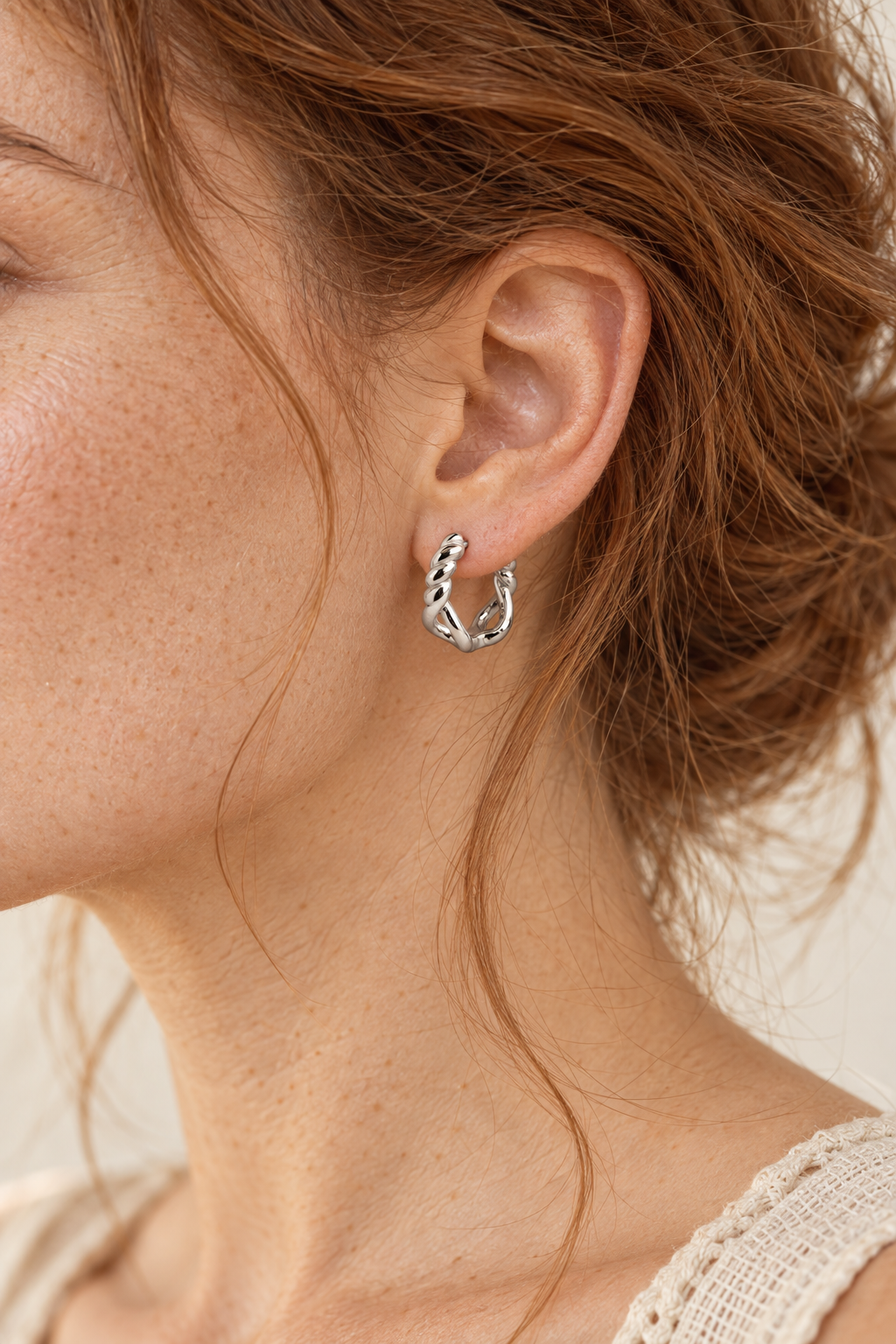 Model wearing Chain Huggies Sterling Silver Hoop Earrings