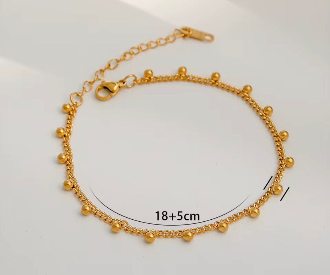 
                  
                    Gold Dangle Bead Bracelet with measurements
                  
                
