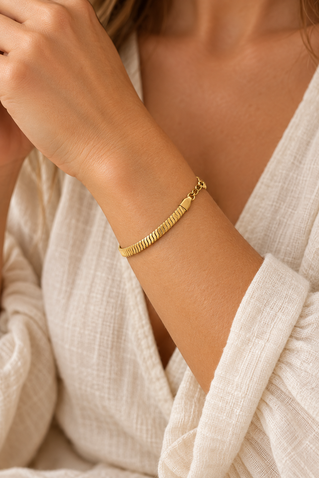 
                  
                    Boho model wearing the gold flat bracelet
                  
                