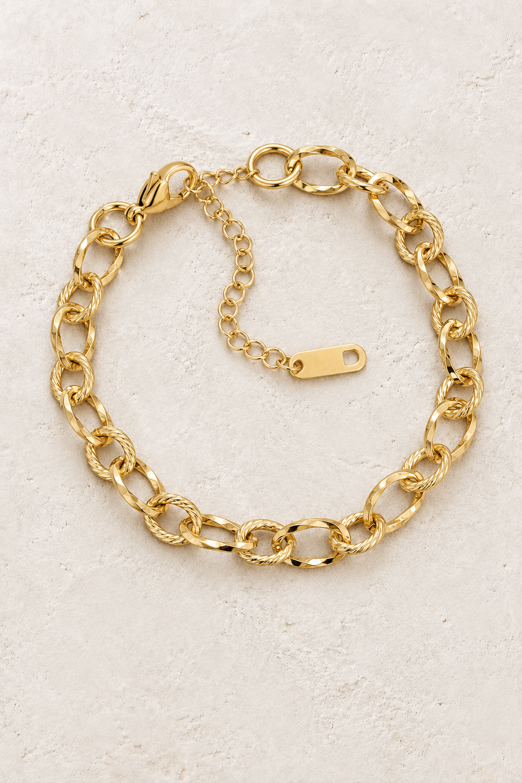 
                  
                    Gold Hammered Mixed Link Bracelet on ivory stone
                  
                