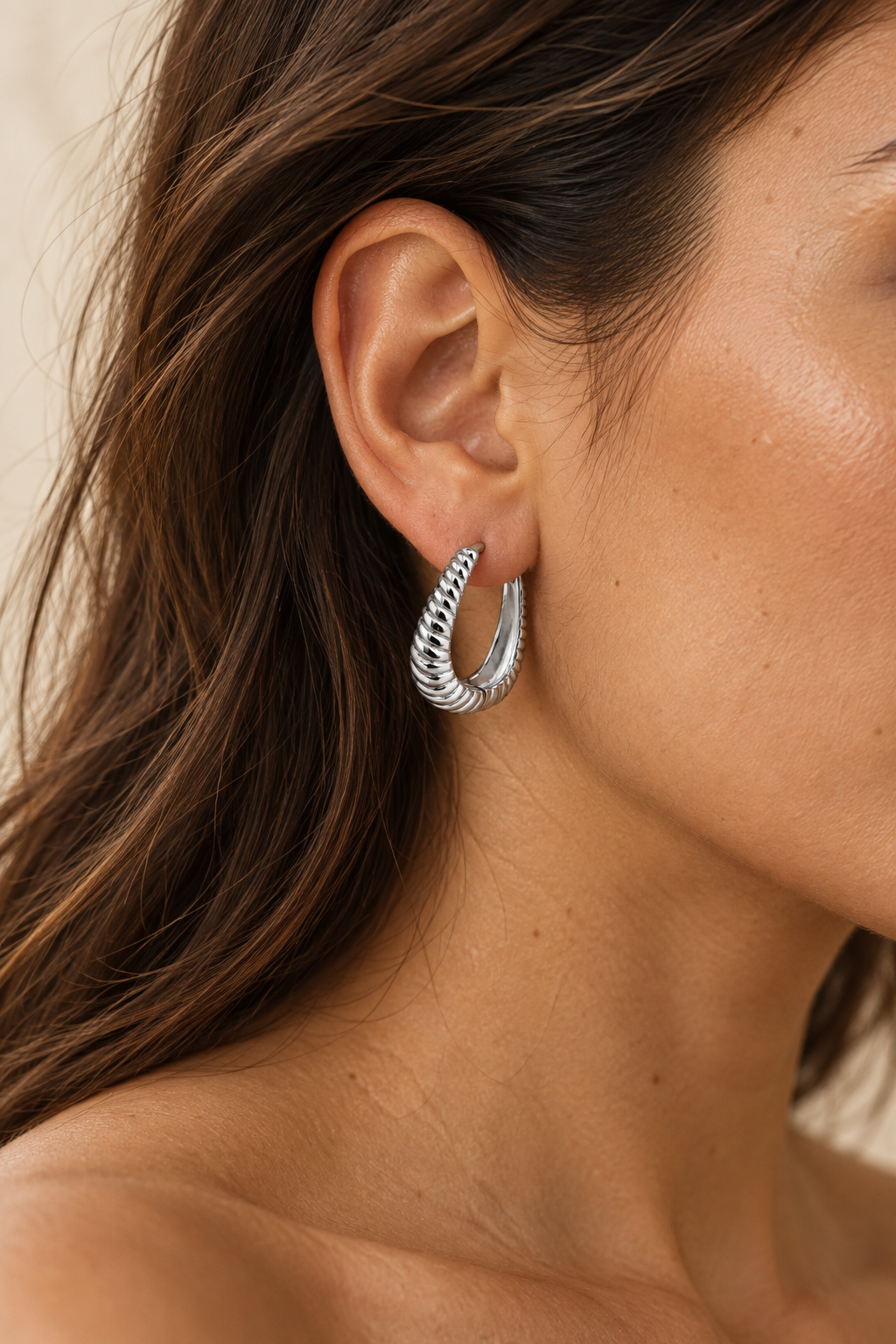 Model wearing Boho & Mala Huggies Sterling Silver Hoop Earrings DE100069
