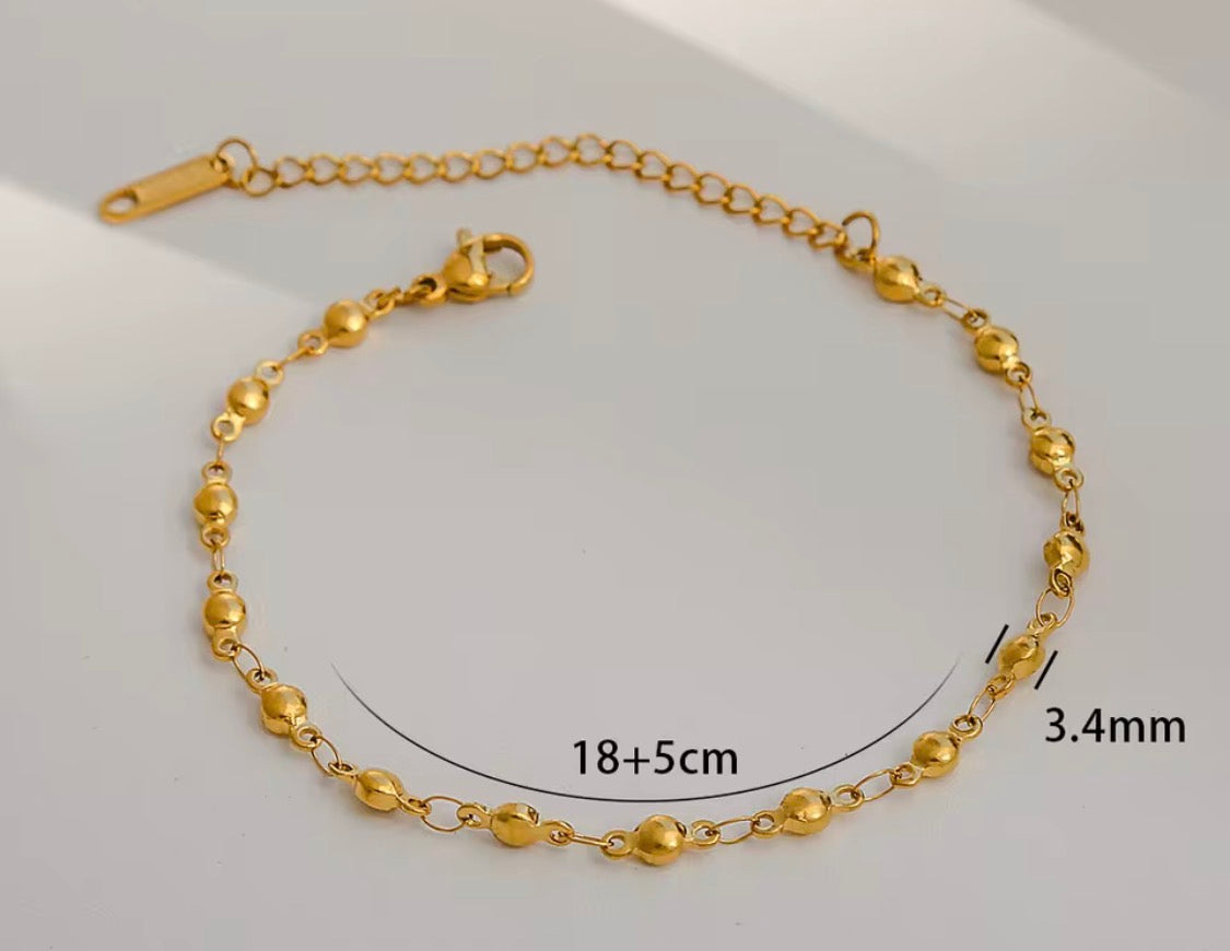 
                  
                    Gold Spaced Bead Bracelet with measurements
                  
                