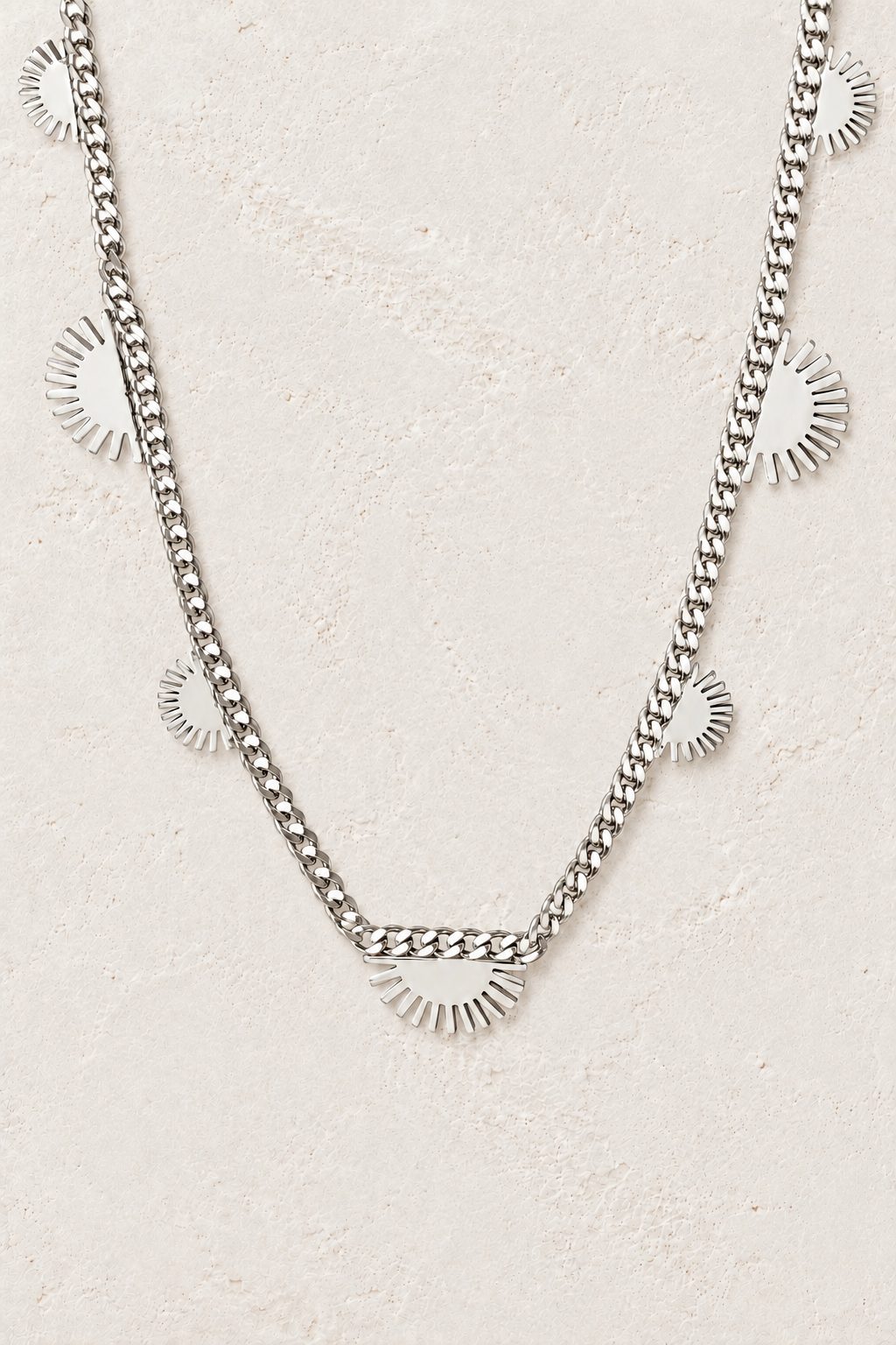Minimalist Pendant Necklace on the Boho & Mala cream stone hero background