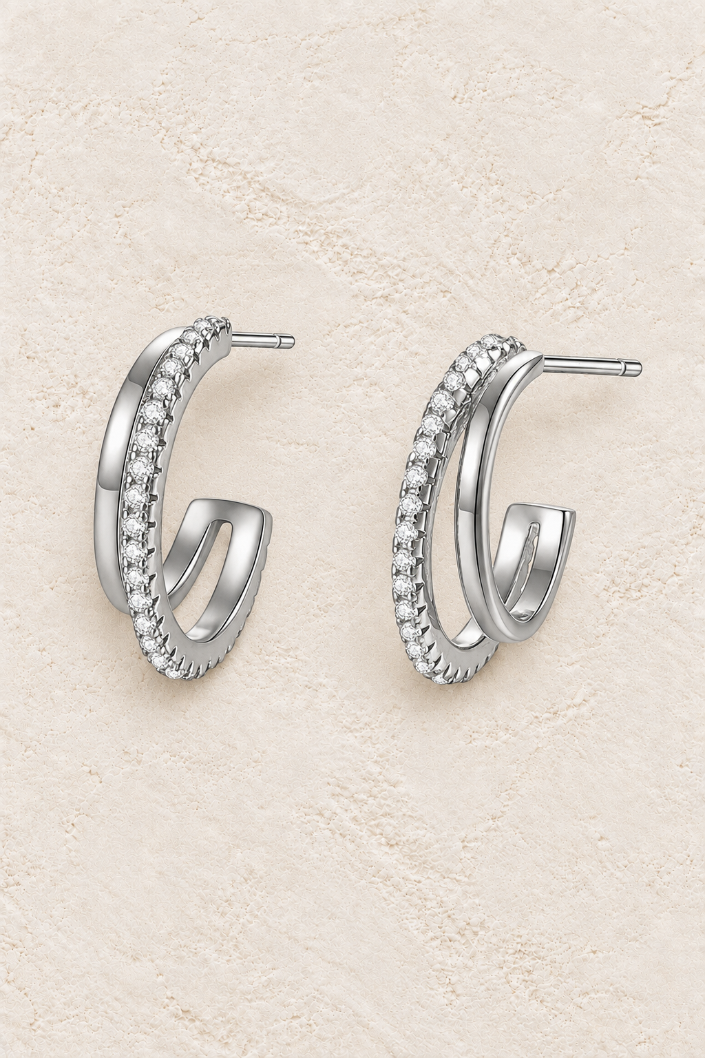 Boho & Mala Sterling Silver Stud Hoop Earrings on warm cream textured background