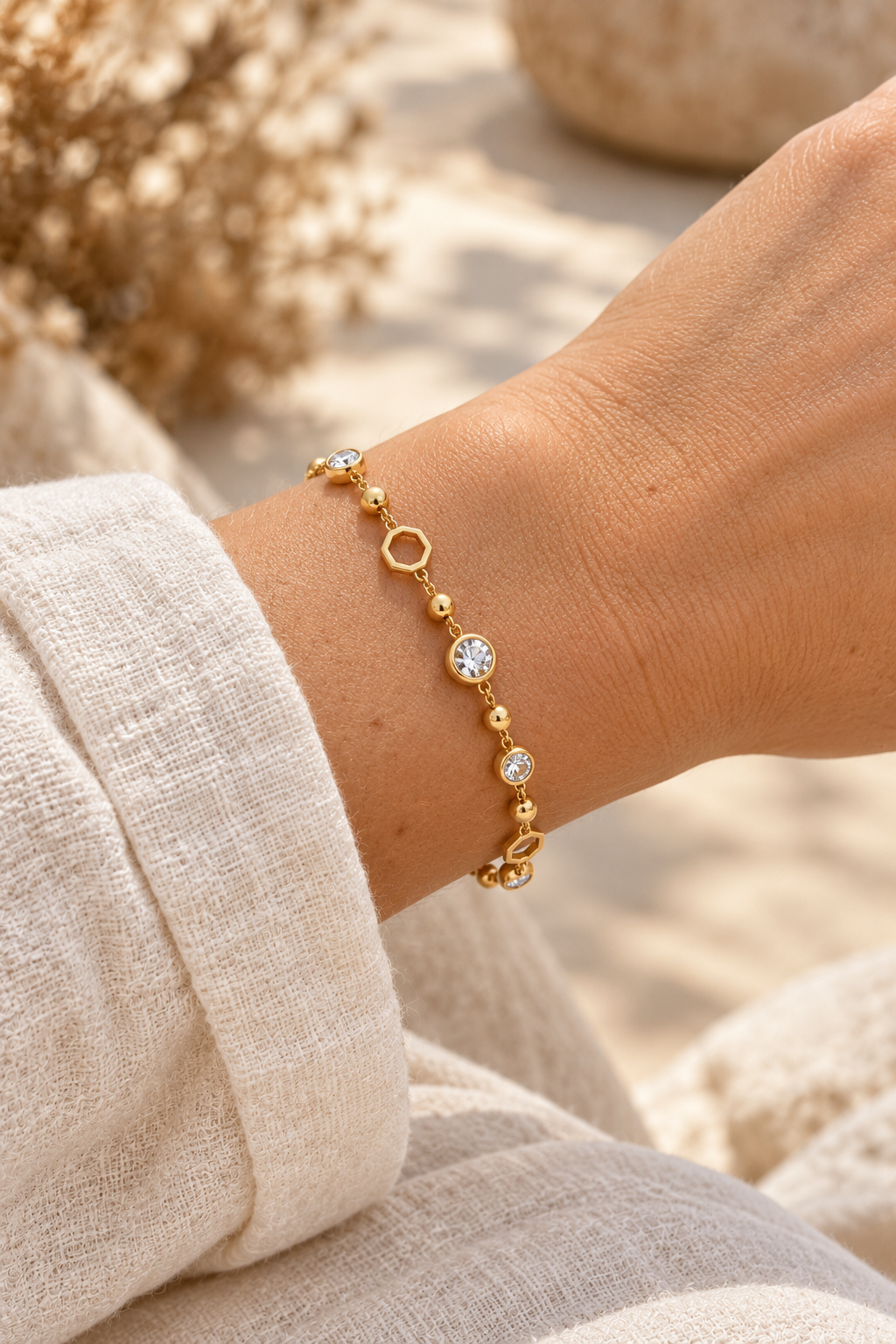 Crystal & Hexagon Waterproof Bracelet – Gold worn on model wrist – AI styling illustration