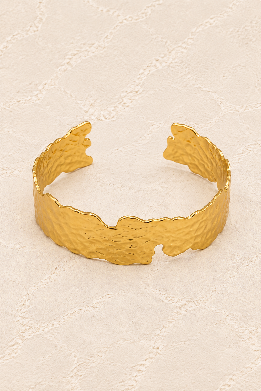 
                  
                    Brisa Max Adjustable Cuff Bracelet on ivory plaster, tall product cover
                  
                