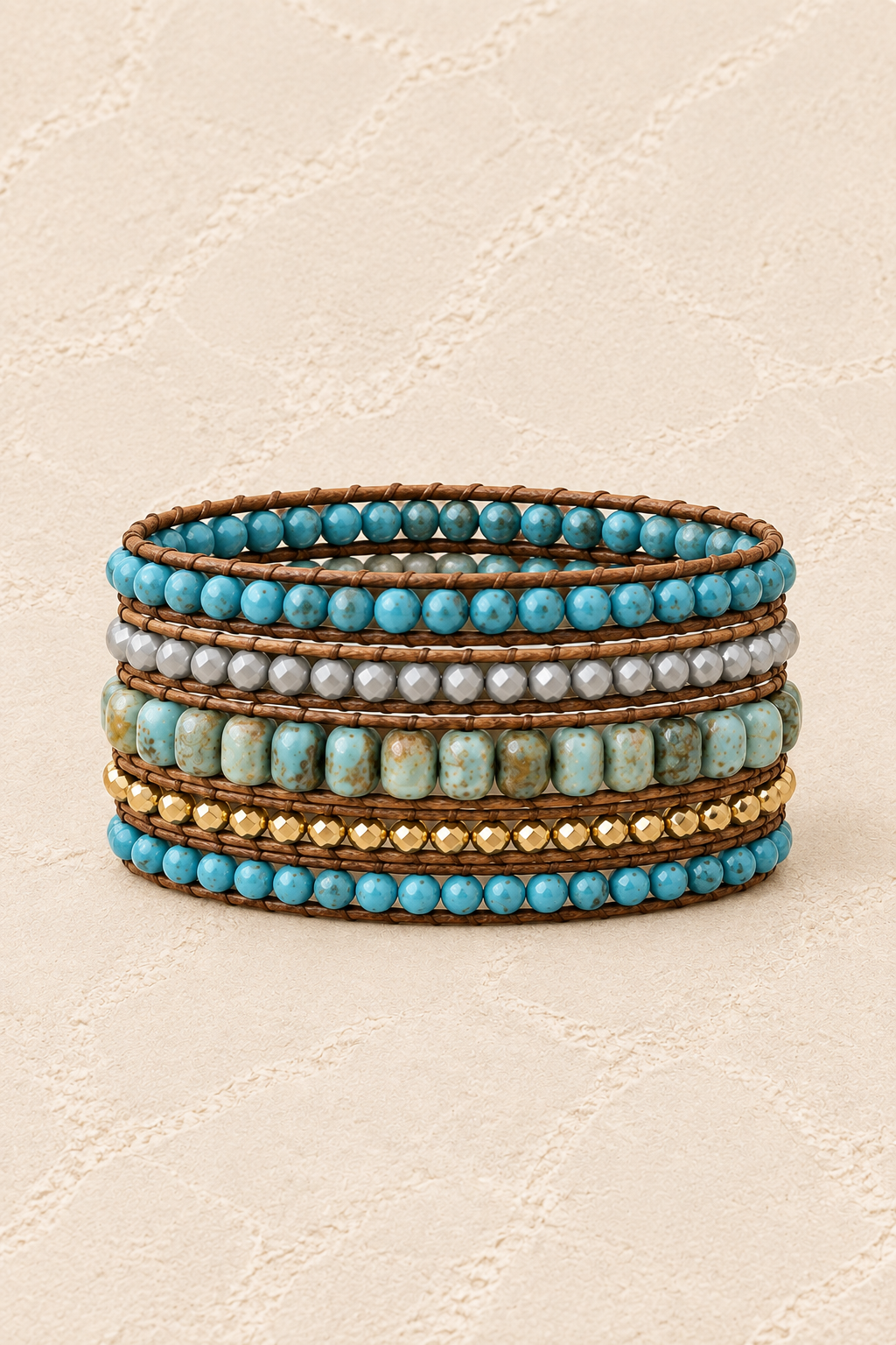 
                  
                    Handmade African Turquoise Mixed Natural Stone 5 Wrap Bracelet on ivory plaster, tall product cover
                  
                