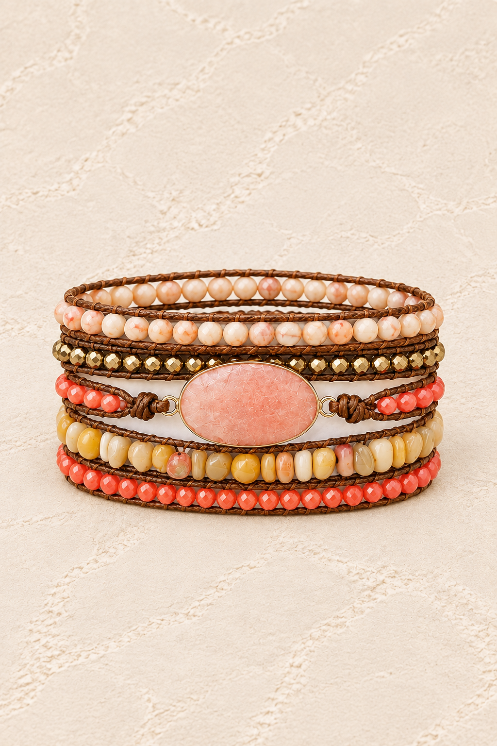 Handmade Peach Jade Mixed Natural Stone Wrap Bracelet on ivory plaster, tall product cover