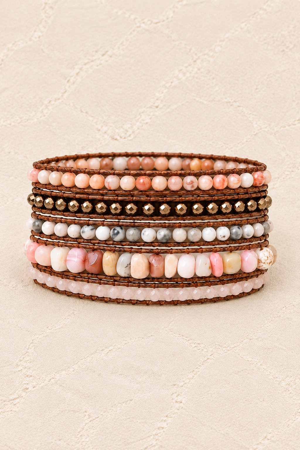 Handmade Blush Mixed Natural Stone 5 Wrap Bracelet on ivory plaster, tall product cover