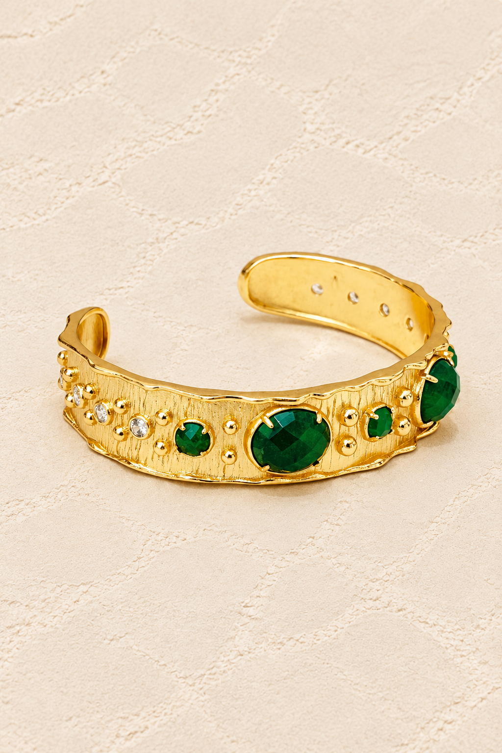 
                  
                    Green Jade Solara Cuff Bracelet on ivory plaster, tall product cover
                  
                