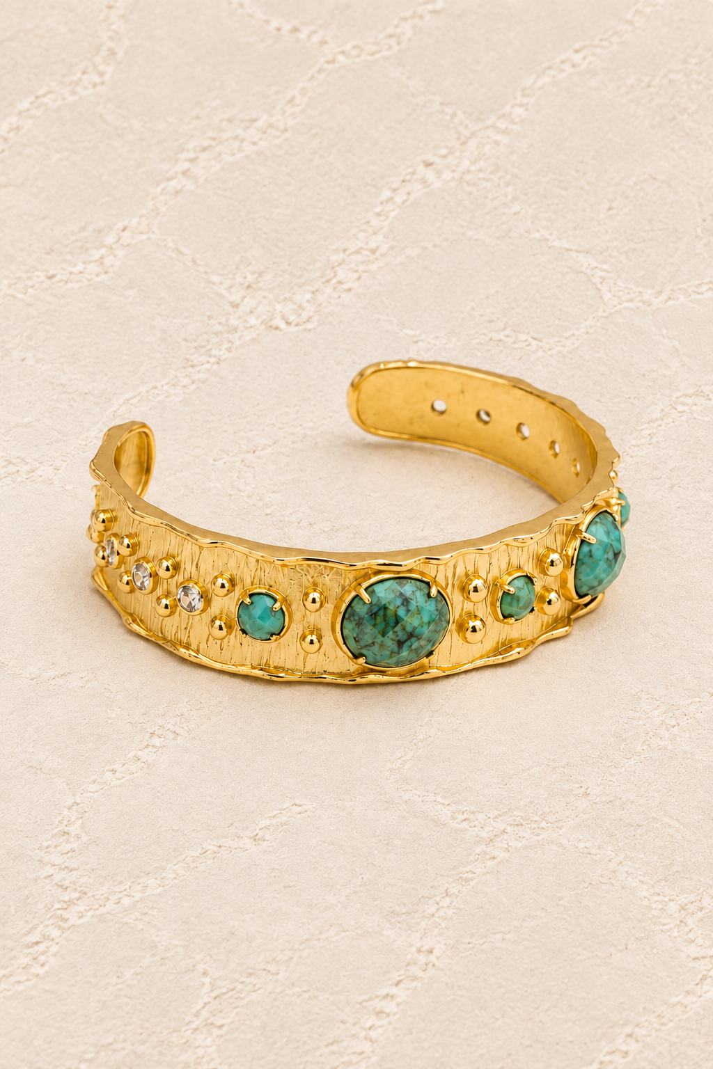 
                  
                    African Turquoise Solara Cuff Bracelet on ivory plaster, tall product cover
                  
                