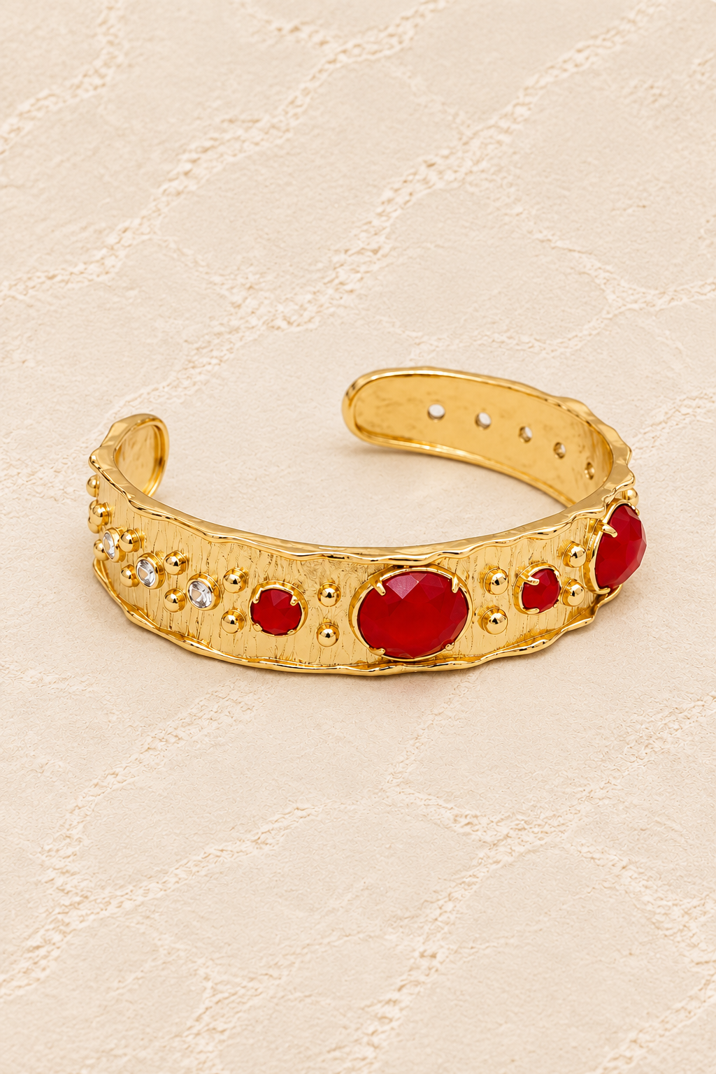 Red Jade Solara Cuff Bracelet on ivory plaster, tall product cover