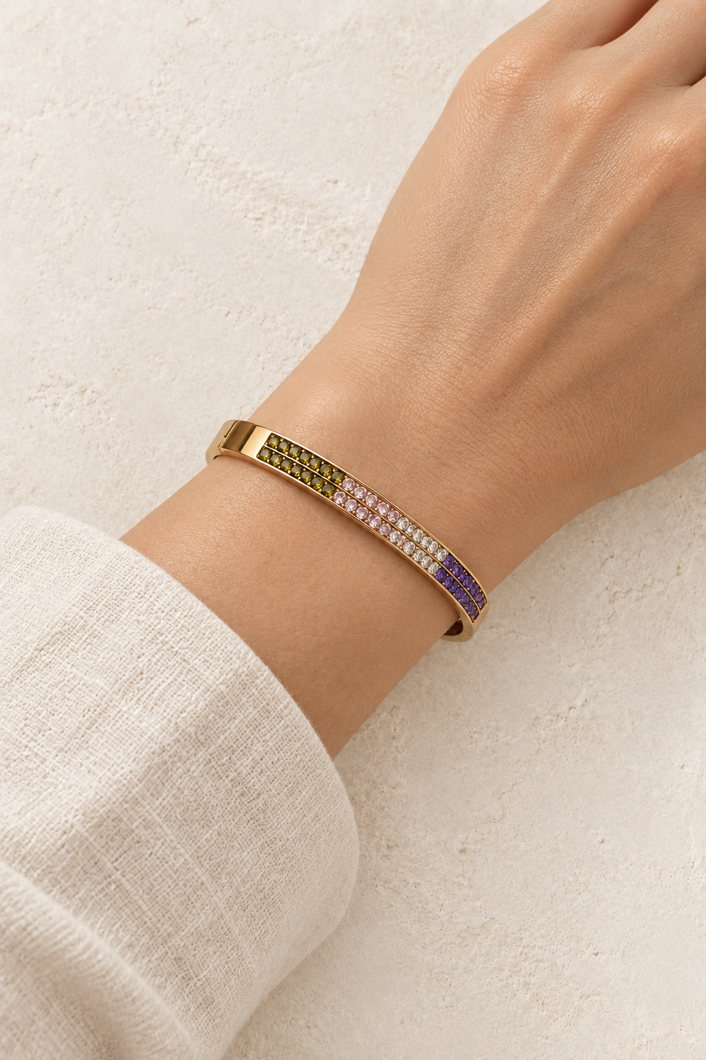 Model wearing Calista Gold Multicolour Pavé Bangle