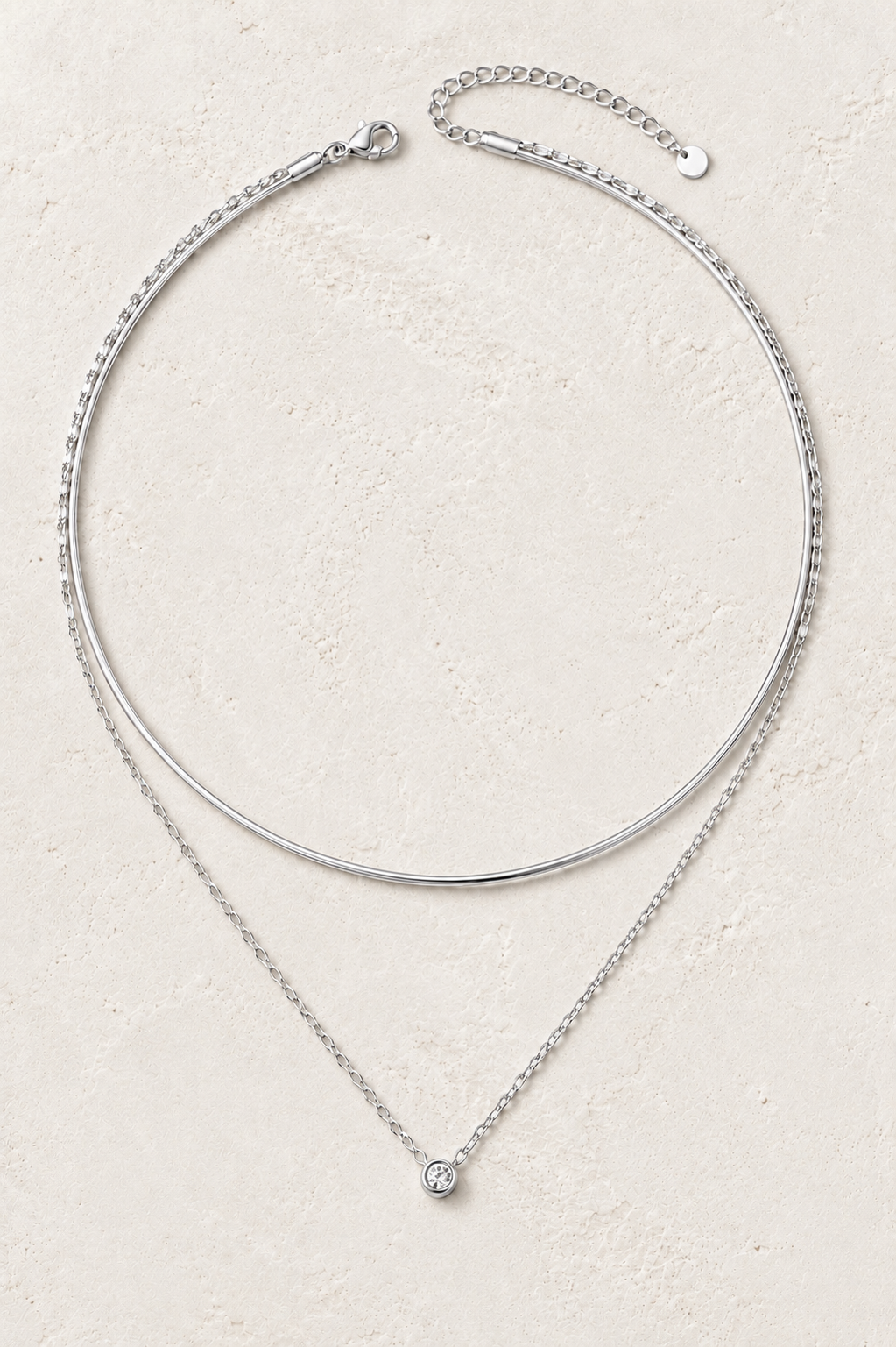 Aria Silver Double Layer Zirconia Necklace on the Boho & Mala cream stone hero background