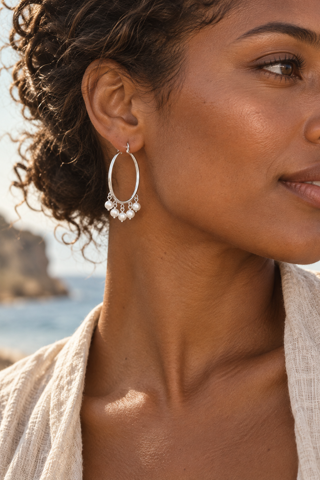 Boho model wearing Cascada Silver Pearl Hoops